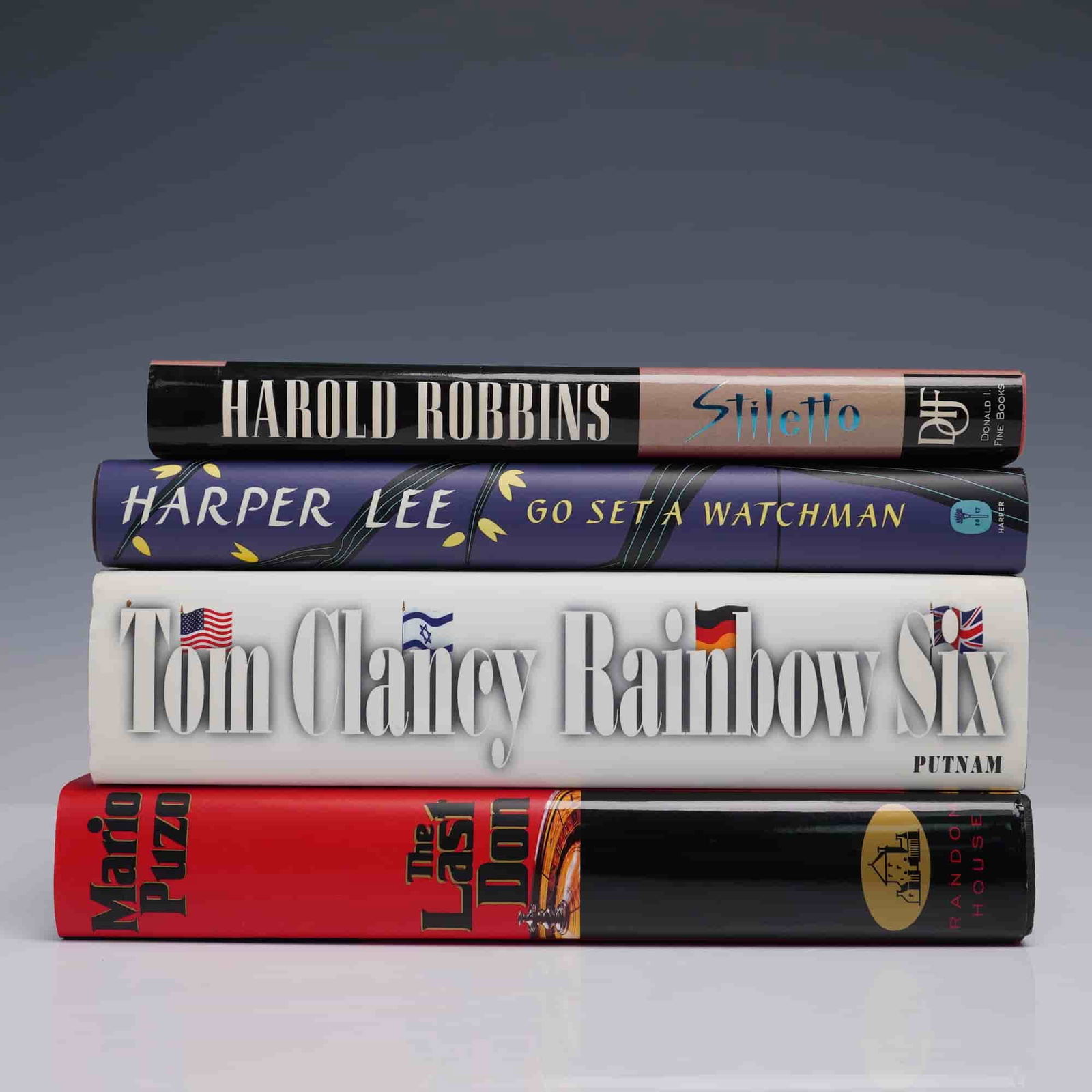 4pc Hardcover Book Lot Puzo Clancy Lee Robbins: Four-piece hardcover book lot including fiction bestsellers by renowned authors. Titles include The Last Don by Mario Puzo, Rainbow Six by Tom Clancy, Go Set a Watchman by Harper Lee, and Stiletto by