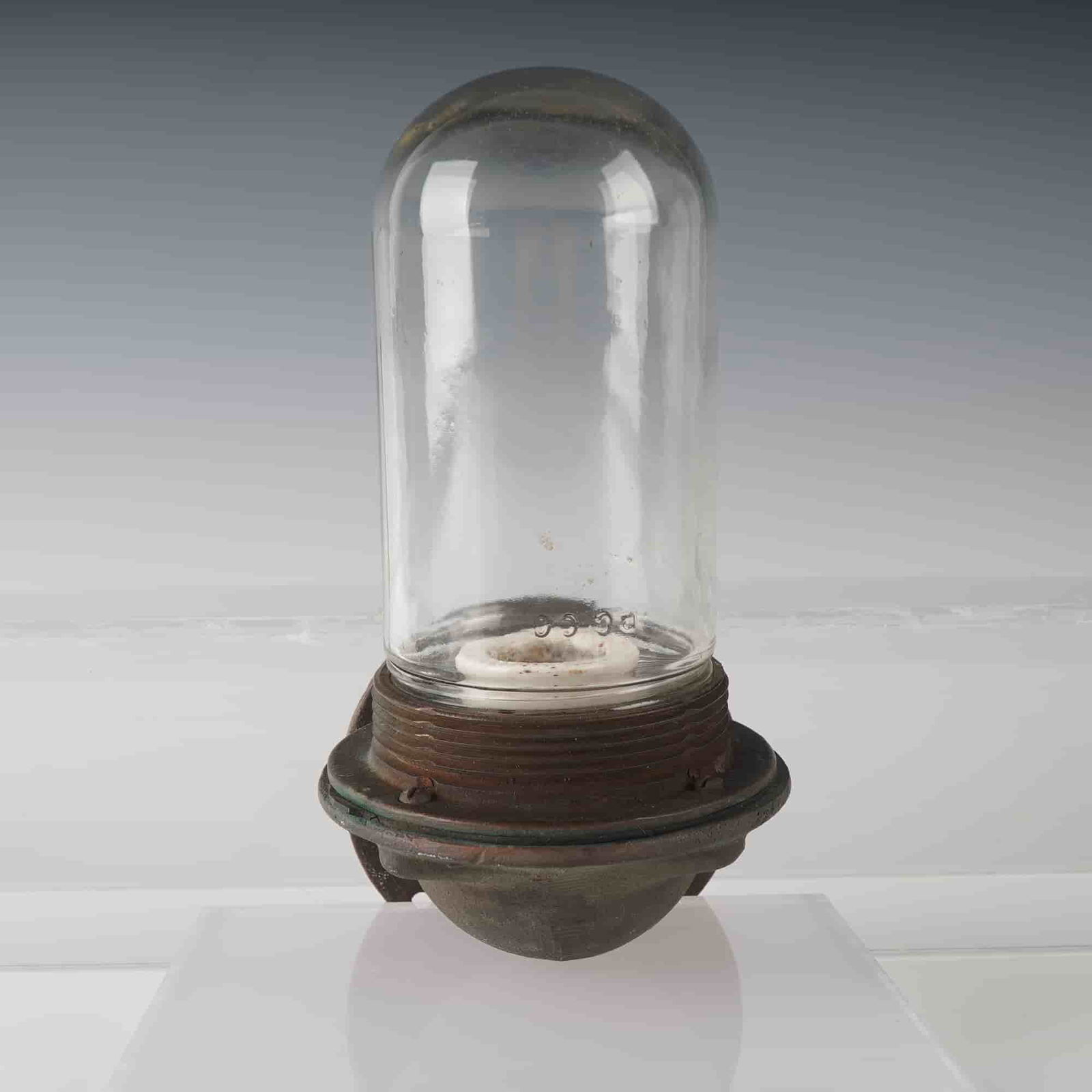 Industrial Explosion-Proof Light Fixture with P C Co Glass Globe: A vintage industrial explosion-proof or weather-sealed light fixture featuring a thick clear glass dome marked P C Co, indicating manufacture by Pittsburgh Corning. The fixture includes a threaded