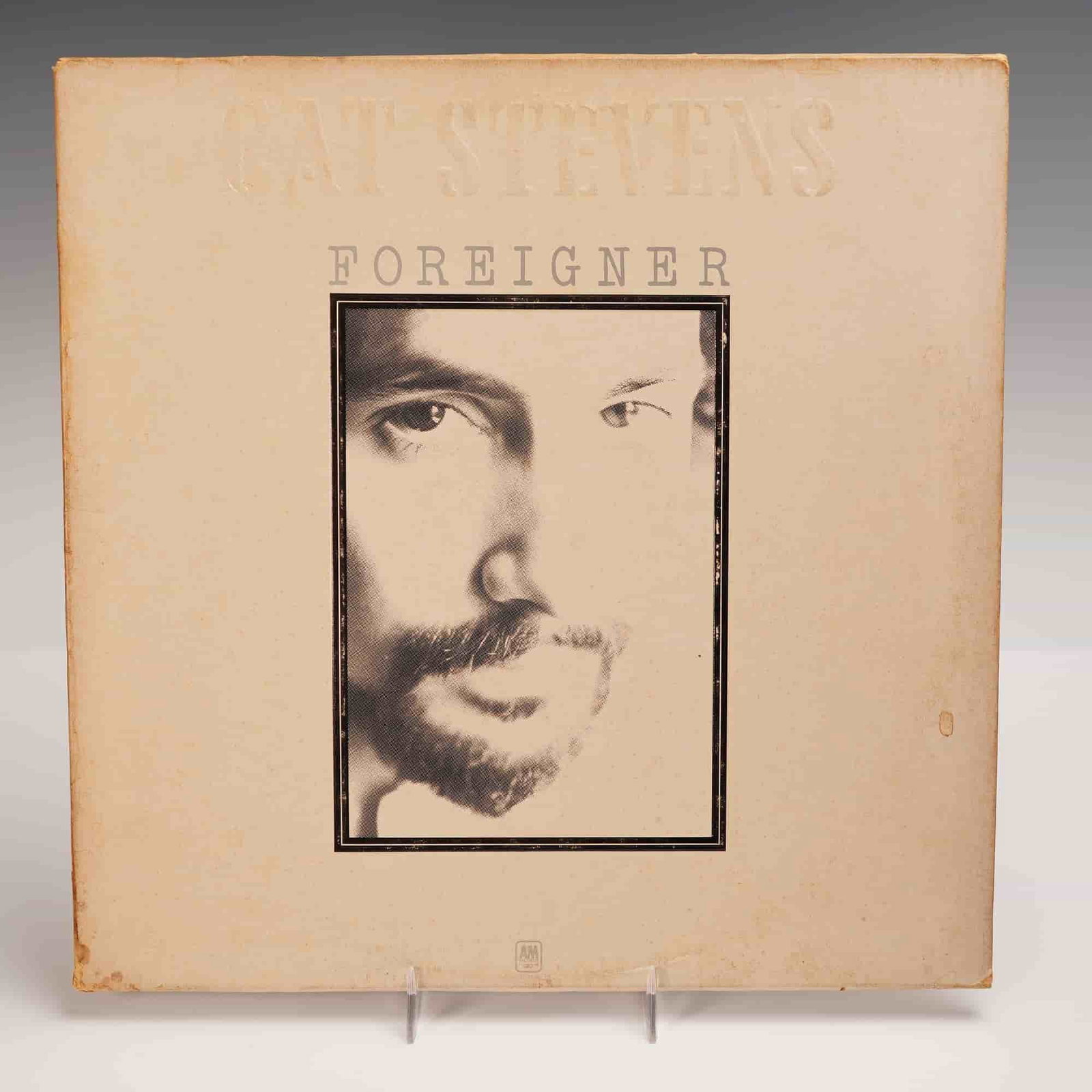 A&M Records Cat Stevens Vinyl Record, Foreigner: Original 1973 U.S. pressing of Foreigner by Cat Stevens, released on A&M Records. This LP features a distinctive gatefold sleeve with minimalist cream colored front artwork showcasing a monochromatic