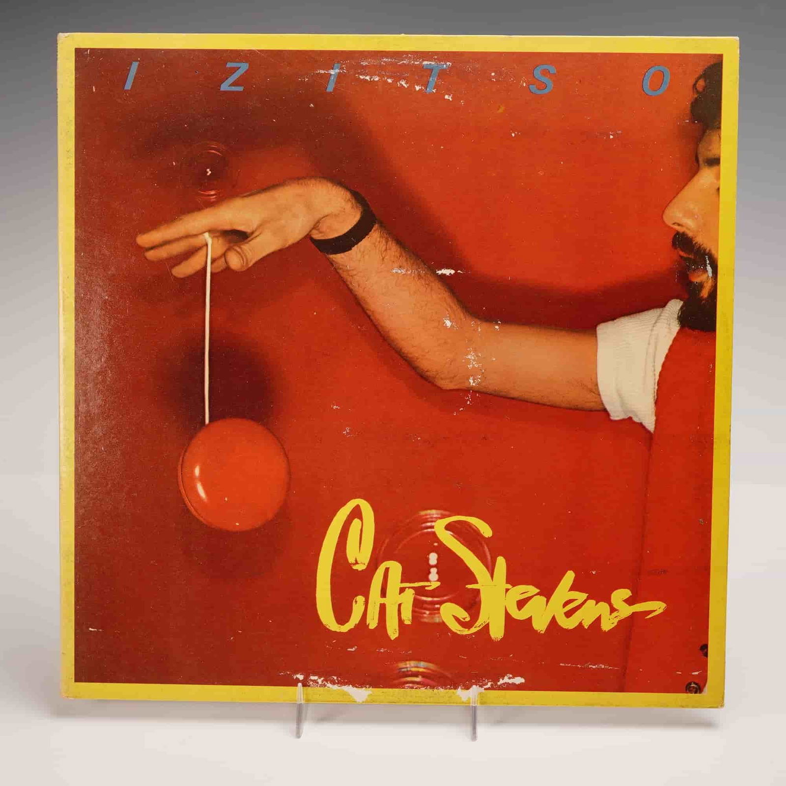 A&M Records Cat Stevens Vinyl Record, Izitso: A 12-inch vinyl LP of "Izitso" by Cat Stevens, released in 1977 on A&M Records. The album features a blend of soft rock, folk, and early electronic influences across ten tracks including "(Remember th