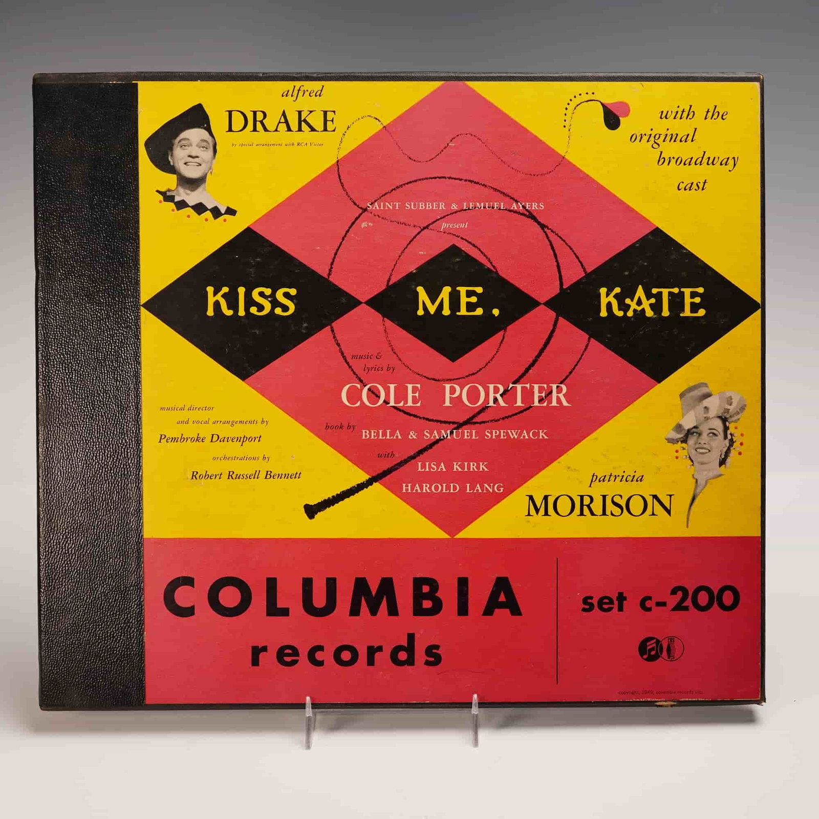 Columbia Records Kiss Me, Kate Original Broadway Cast Vinyl Album Set: An original Columbia Records vinyl album set featuring the acclaimed 1948 Broadway production of Kiss Me, Kate with music and lyrics by Cole Porter. This deluxe release includes multiple 78 RPM record