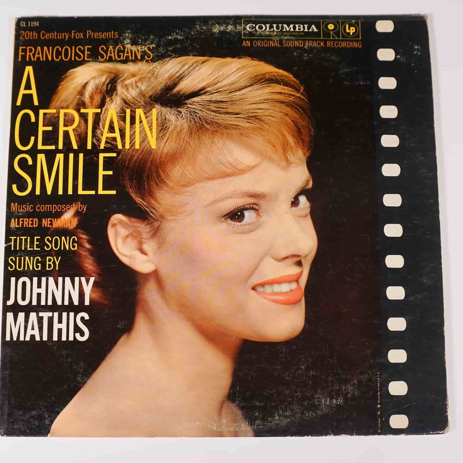 Columbia Records Vinyl, A Certain Smile Soundtrack: This Columbia Records vinyl LP features the original motion picture soundtrack for A Certain Smile, with a musical score by Alfred Newman and the title song performed by Johnny Mathis. Released in 195