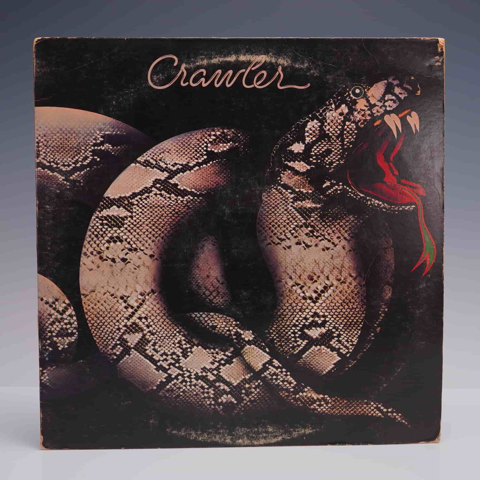Crawler - Self-Titled Debut LP Record: A hard-driving yet soulful gem of late -'70s British rock, Crawler marks the eponymous debut of the short-lived but deeply talented band formed from the remnants of the legendary Back Street Crawler.