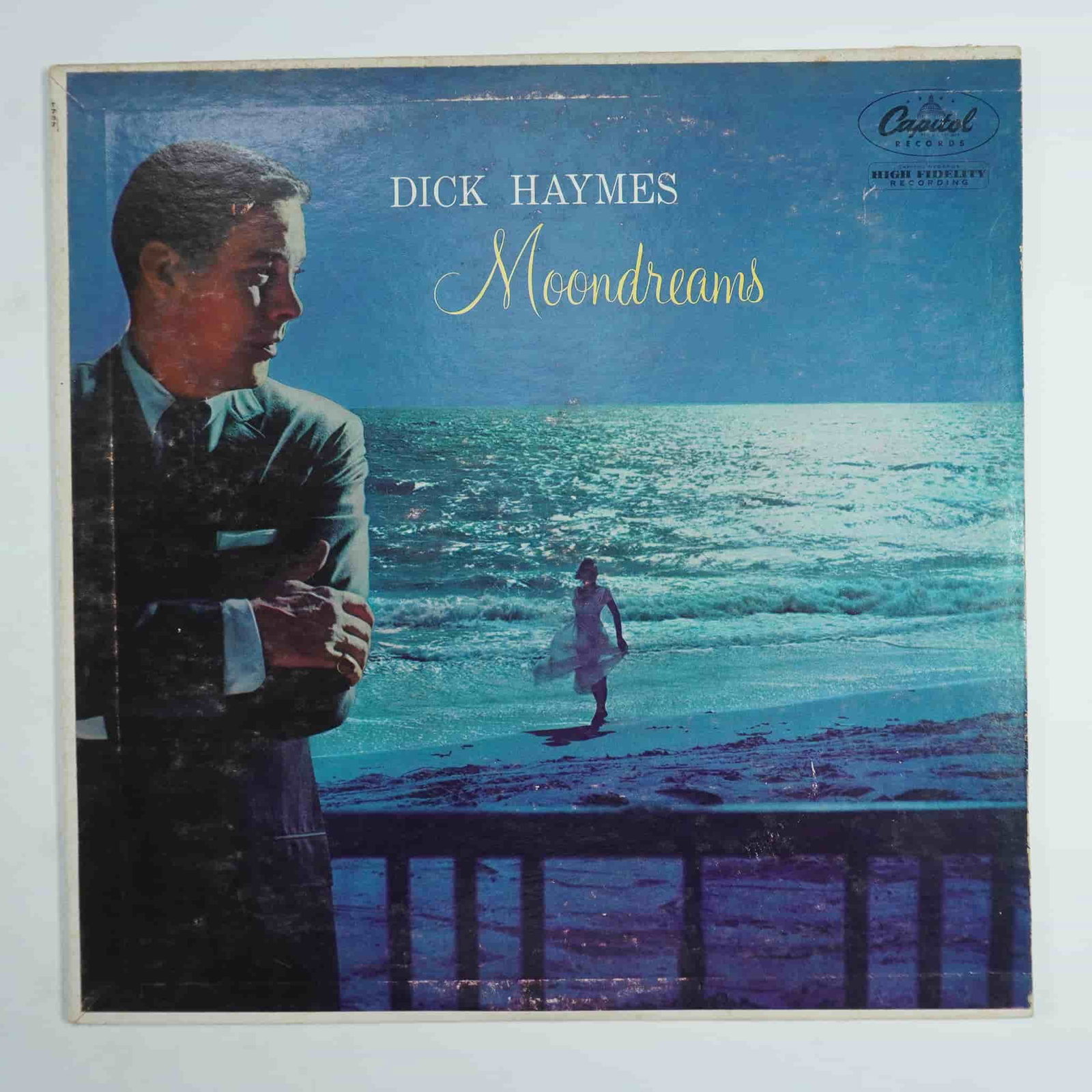 Dick Haymes Moondreams Jazz Vinyl LP: Dick Haymes Moondreams released in 1955 in the United States on Capitol Records presents a refined collection of jazz and vocal pop standards showcasing Haymes' smooth baritone and elegant phrasing. B