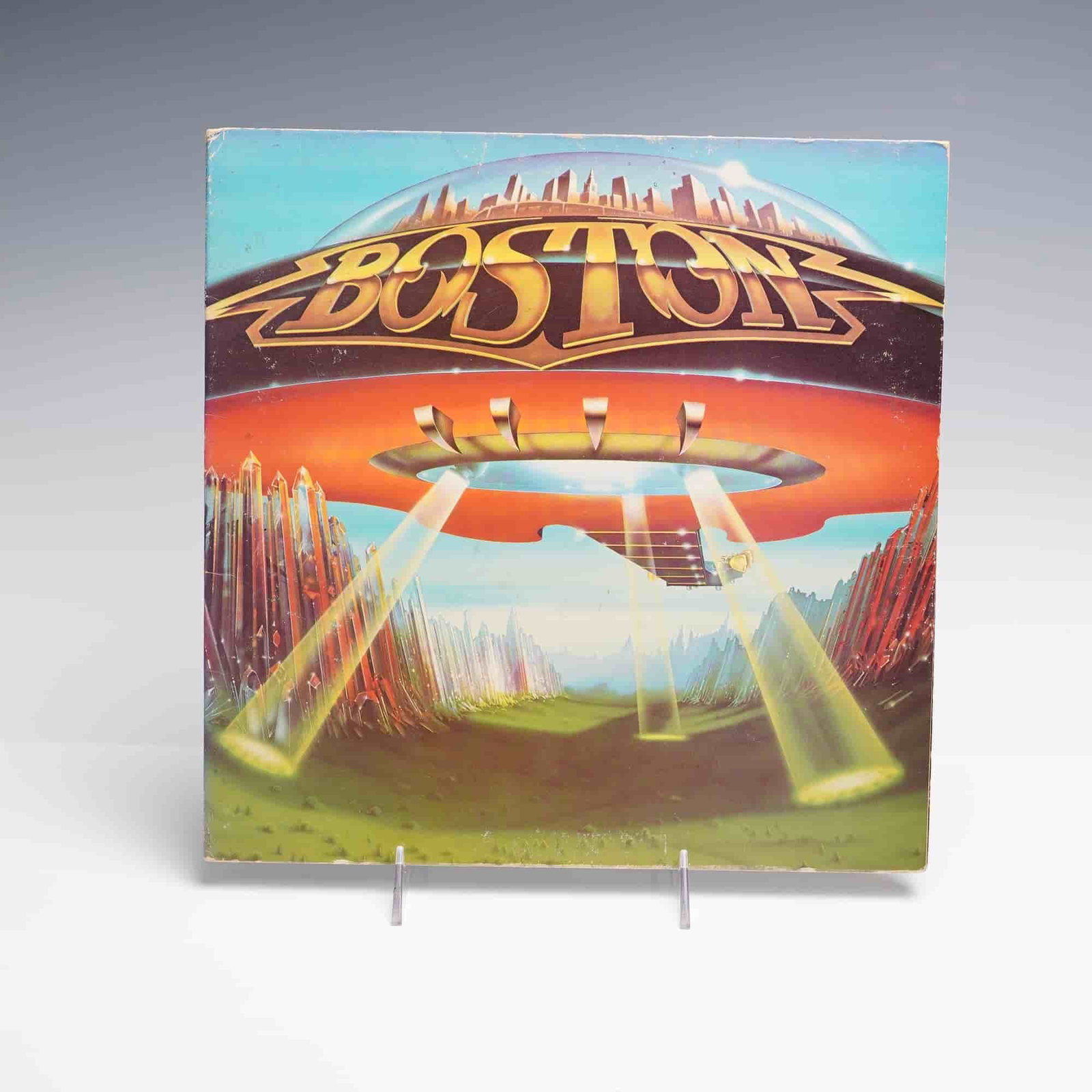 Epic Records Boston Vinyl Record, Don't Look Back: This 12-inch stereo vinyl LP features Don't Look Back, the 1978 follow-up studio album by the American rock band Boston, released under Epic Records. The album includes eight tracks divided across two