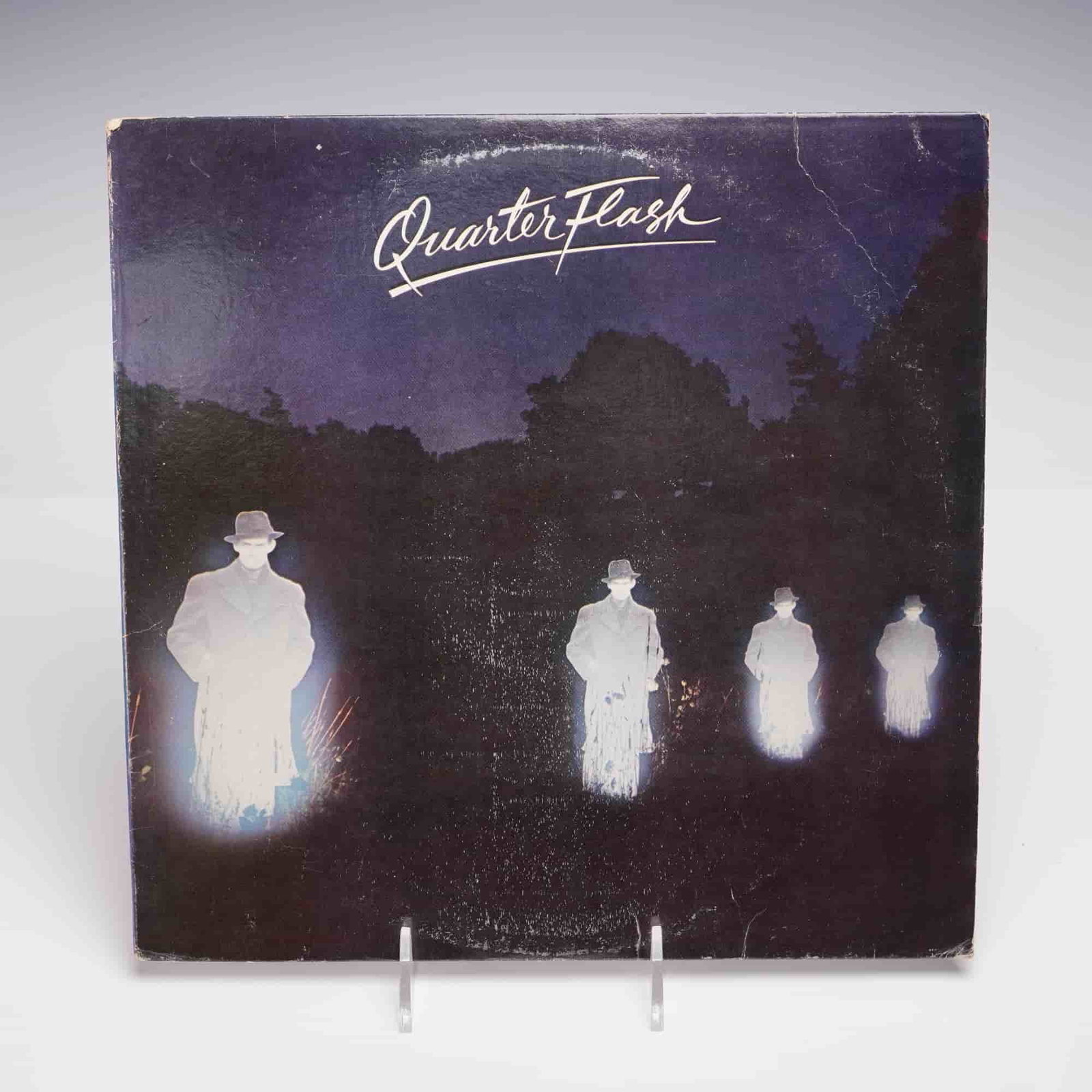 Geffen Records Quarter Flash Vinyl Record, Quarter Flash: The eponymous debut album by Quarterflash, released on Geffen Records. This early 1980s pressing showcases the band's distinctive fusion of rock and new wave, prominently featuring the alto saxophone