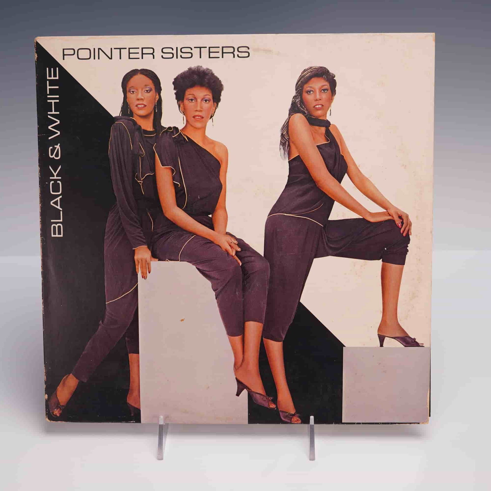 Planet Records Pointer Sisters Vinyl Record, Black & White: This 12-inch stereo vinyl LP features Black & White, the 1981 release by The Pointer Sisters, issued by Planet Records. The album is presented in two sides, with Side One including the tracks "Sweet L