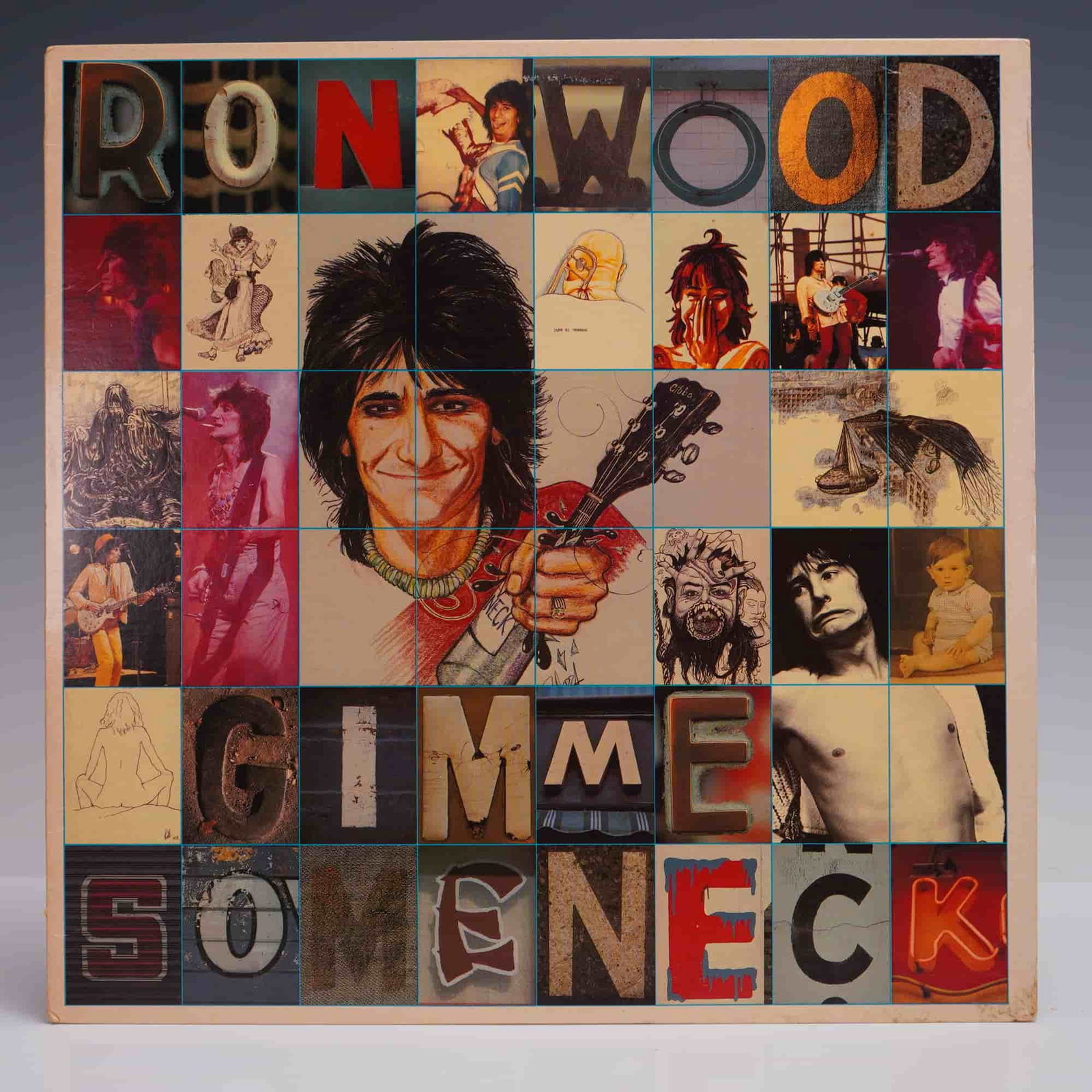 Ron Wood LP Record - Gimme Some Neck, 1979: Ron Wood - Gimme Some Neck vinyl LP album, released in 1979 on Columbia Records (JC 35702). This solo release by Ron Wood, guitarist of The Rolling Stones and Faces, features a striking collage-style