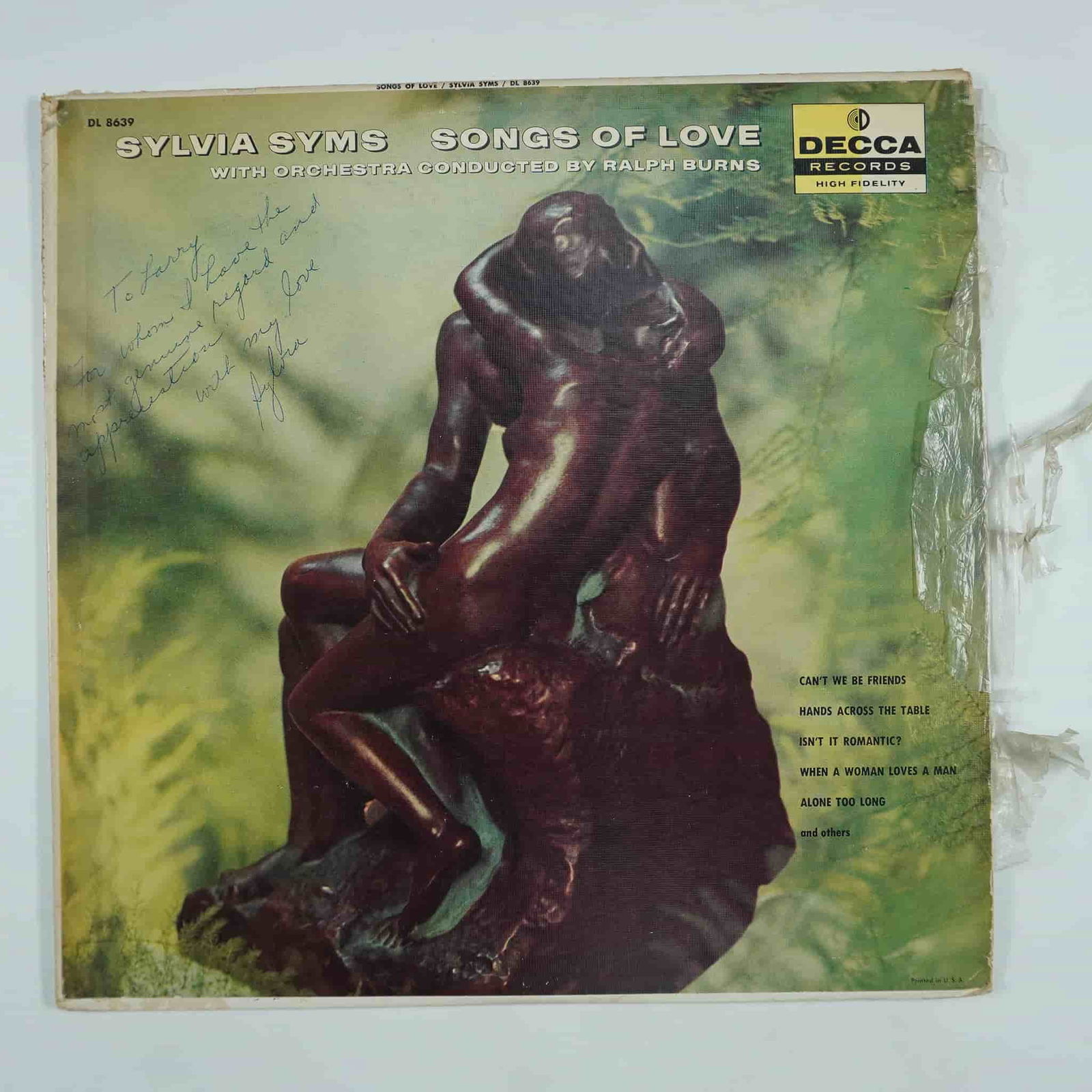 Sylvia Syms Songs of Love Vinyl Record, Signed: Original 1958 pressing of Songs of Love by Sylvia Syms, released on Decca Records (DL 8639). This high-fidelity LP features Syms' rich vocals accompanied by an orchestra conducted by Ralph Burns. The