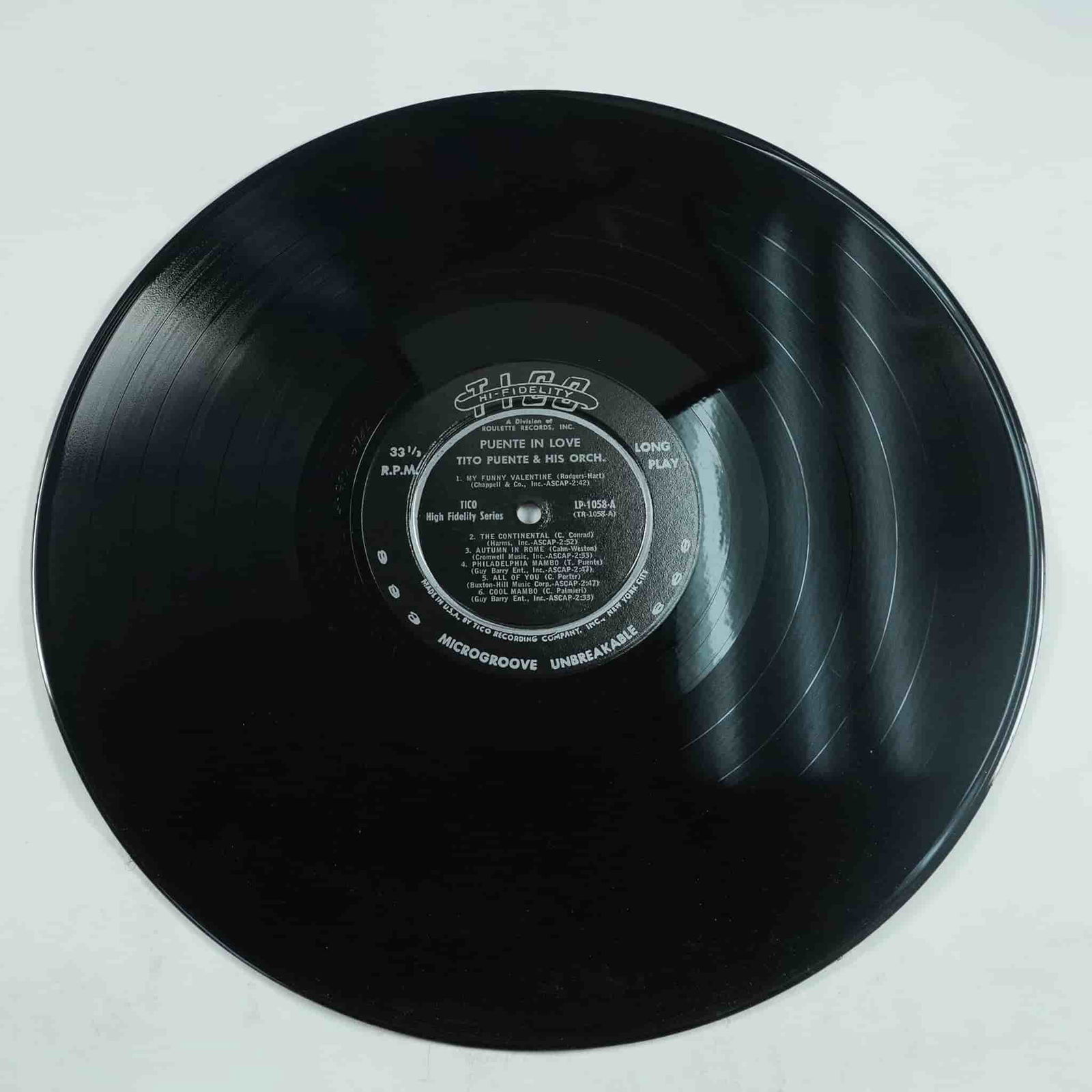 Tito Puente & His Orchestra Puente in Love Vinyl LP, Tico Records: This vintage 33 1/3 RPM vinyl LP, Puente in Love, features Tito Puente & His Orchestra, released on Tico Records (TRLP-1058) as part of their High Fidelity Series. The album showcases Puente’s signa