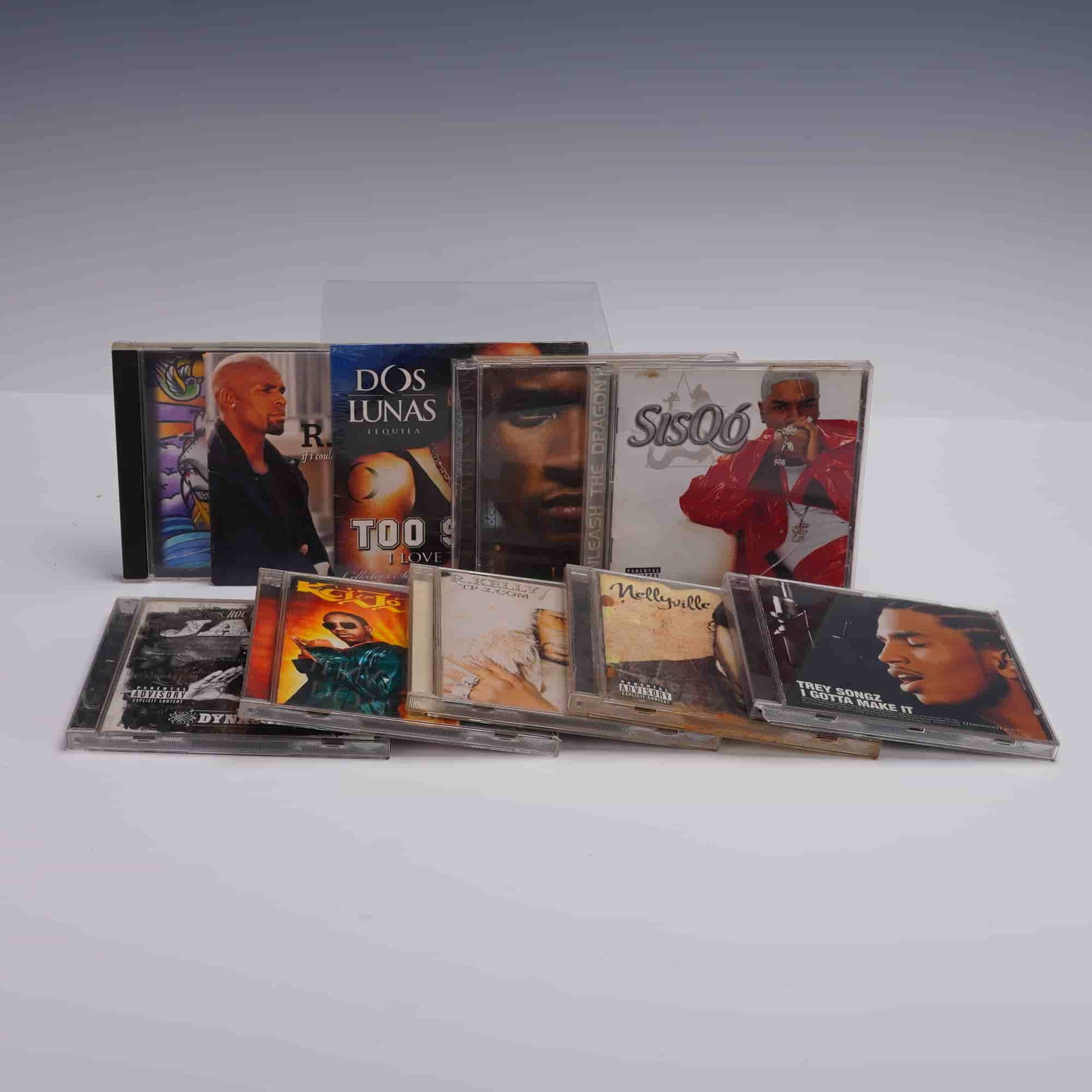 10pc Hip Hop and R&B CD Lot Jay-Z Usher Trey Songz Nelly: Lot of 10 original Hip Hop and R&B CDs featuring top male artists from the early 2000s and beyond. Includes Jay-Z The Dynasty Roc La Familia 2000, Usher Confessions, Trey Songz I Gotta Make It, and Ne