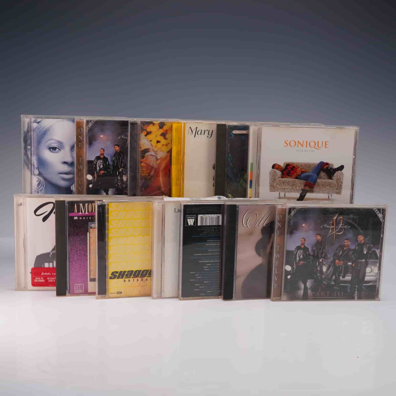 13pc RnB CD Lot Sonique Ginuwine Mary J Blige One Twelve: 13 piece RnB CD collection featuring standout albums by top artists including Sonique Hear My Cry, Ginuwine 100 Percent Ginuwine, and Mary J Blige's Mary and The Breakthrough. Includes two editions of