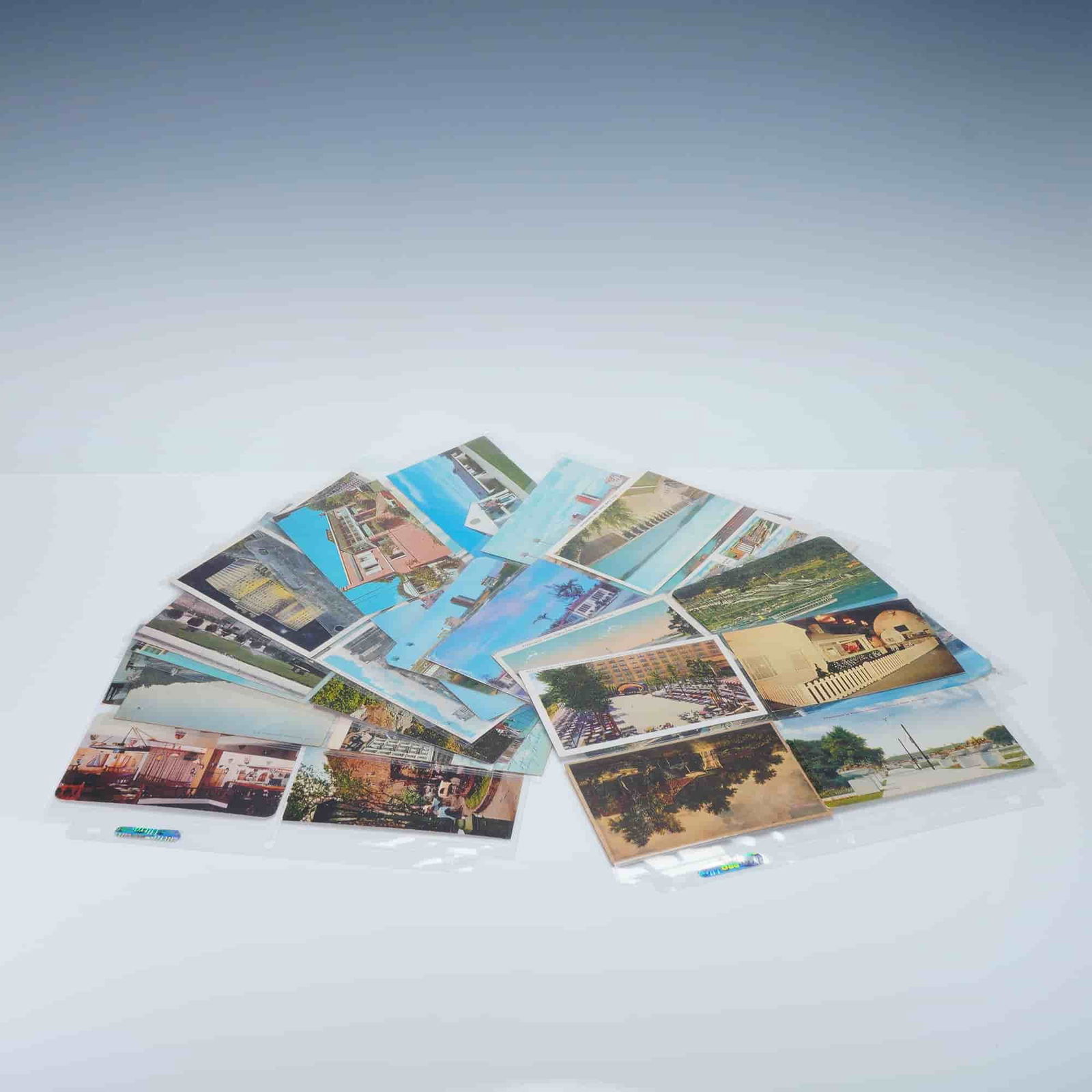 36pc Postcard Collection, Famous Landmarks, Stadiums, & More: This collection features 36 postcards showcasing notable landmarks, iconic international stadiums, famous hotels, and restaurants, as well as places like Chicago and Mexico. The set includes a wide