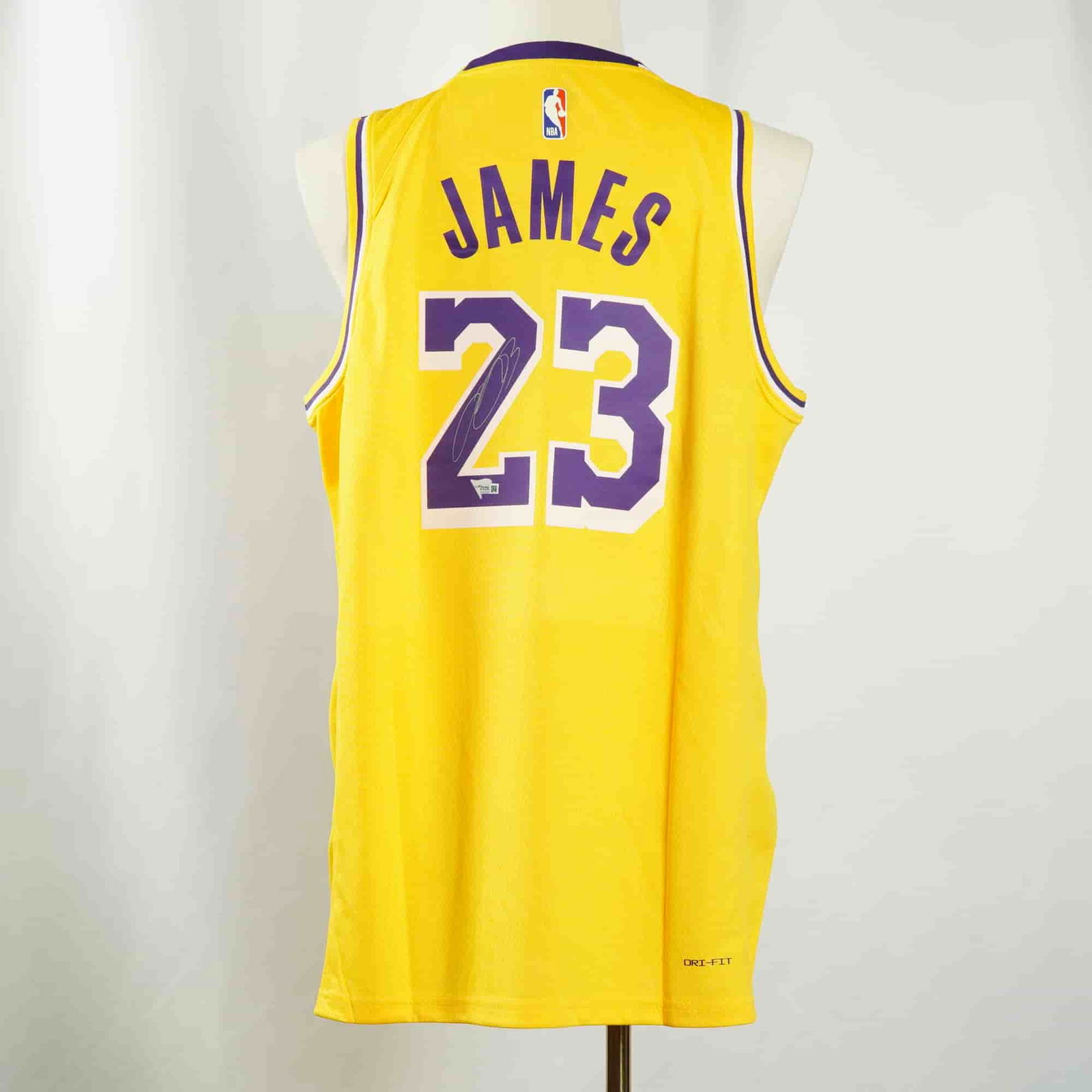 LeBron James Los Angeles Lakers Jersey, Autographed w/ Hologram: This Los Angeles Lakers Icon Edition jersey by Nike is a vibrant gold example featuring LeBron James's iconic number 23, boldly finished in purple and white tackle-twilled lettering. Signed by James