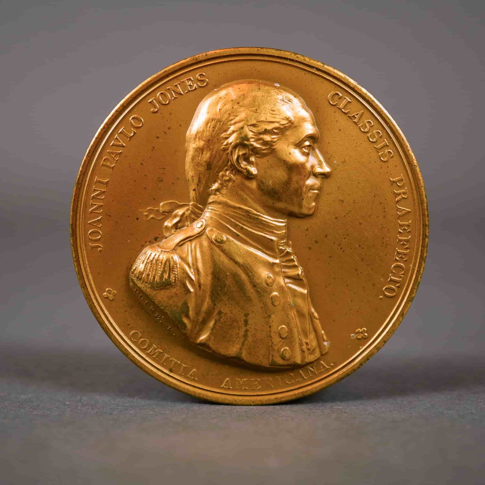 FR 1983 John Paul Jones Comitia Americana Medal, Gilt Bronze: Monnaie de Paris restrike of the original 1787 Congressional medal. Comitia Americana obverse and reverse. Key identifiers include the cornucopia privy mark and 83 date stamp on the obverse. Signed