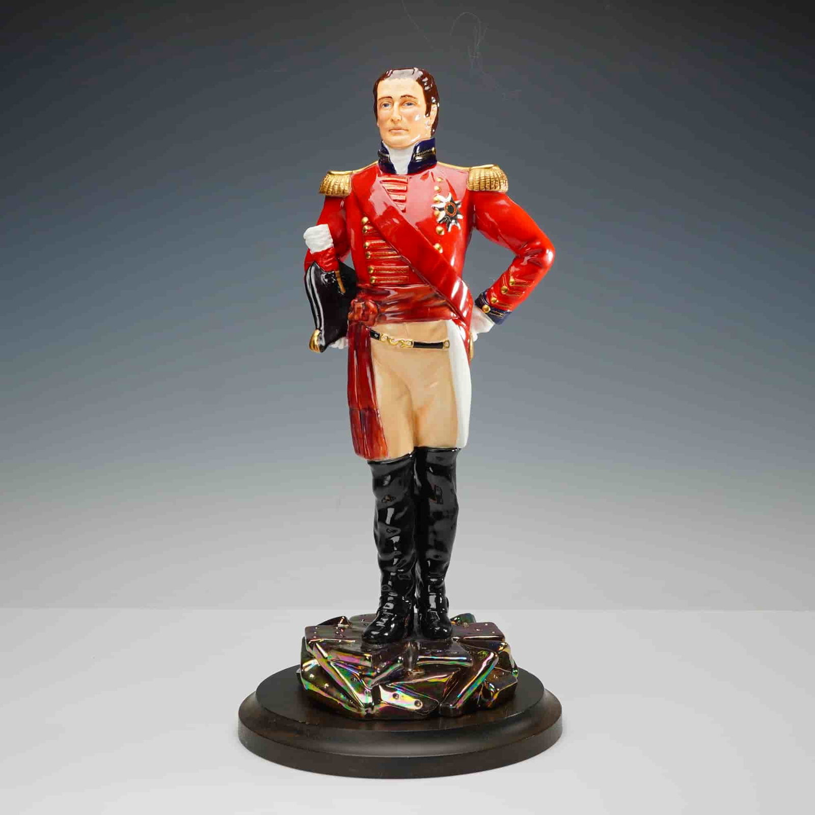 Michael Sutty Porcelain Sculpture, Duke of Wellington 1805: This limited edition porcelain figure presents a detailed study of the Duke of Wellington in full military attire, rendered in bold colors and crisp hand-painted accents. It captures the uniform featu