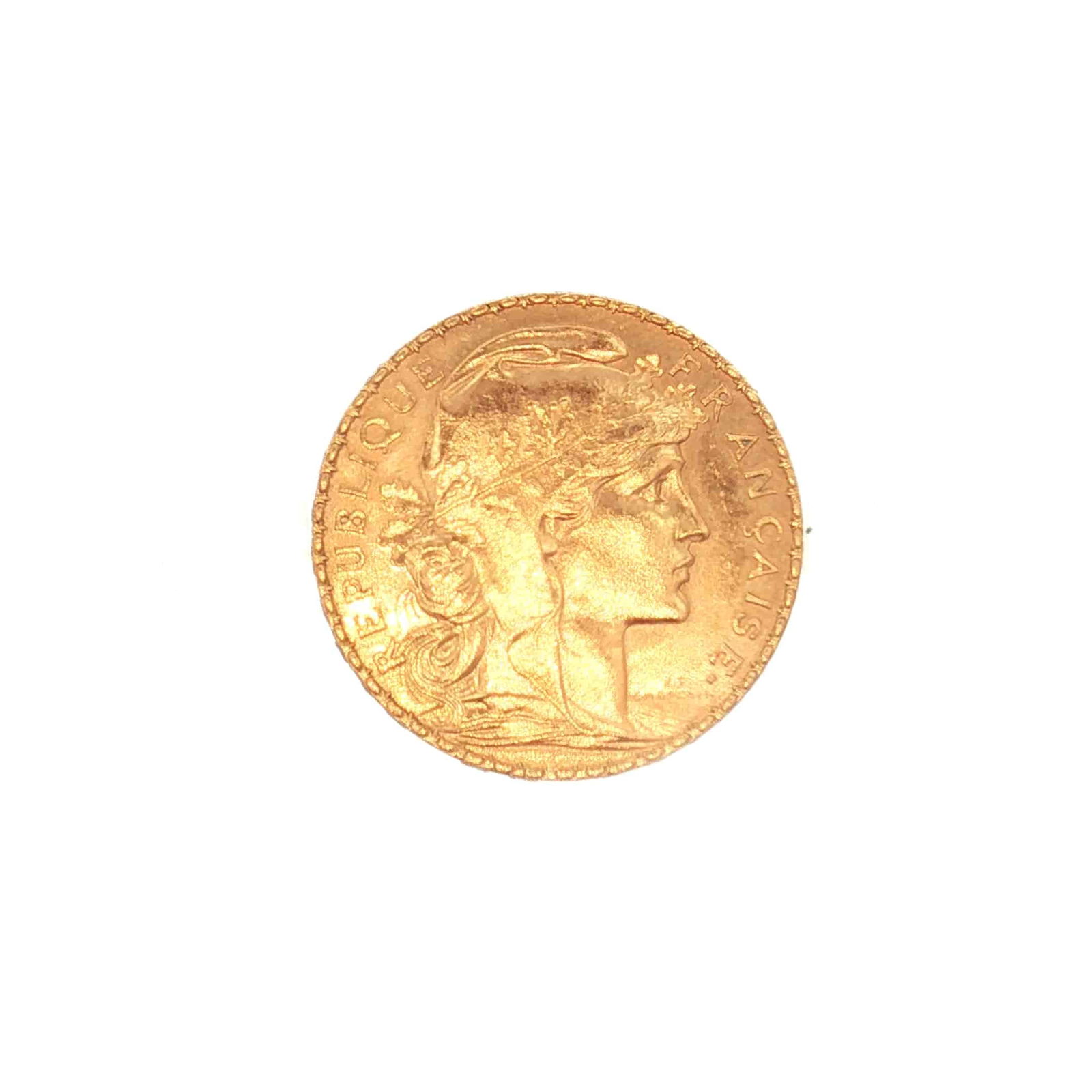1903 French 20 Francs Rooster Gold Coin: Minted by the Monnaie de Paris. The obverse depicts the right-facing profile of Marianne wearing a Phrygian cap and an oak branch crown. The reverse displays the French motto "Liberte, Egalite,