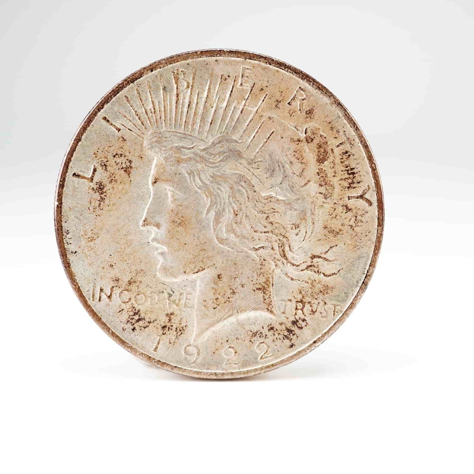US 1922 Peace Dollar, Silver, KM# 150: KM# 150. Philadelphia Mint. Peace Dollar type. This 1922 U.S. Liberty one dollar coin represents the first year of the modified relief design following the 1921 high relief issue. Key identifier: