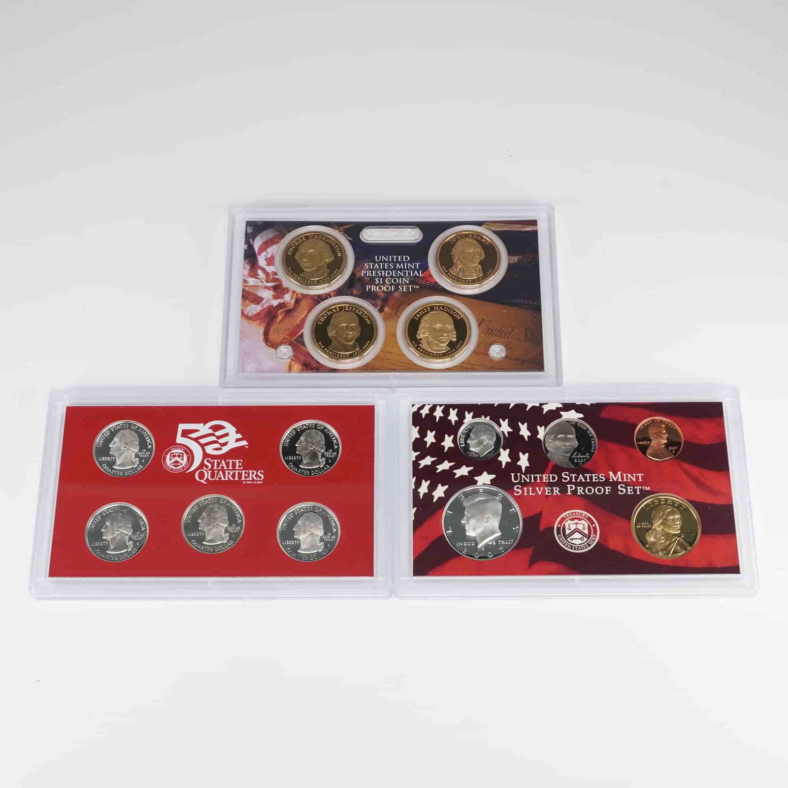 2007-S United States Mint Silver Proof Set: Presented in original U.S. Mint packaging, this 14-coin proof collection is divided into three protective hard plastic cases. One case contains the Lincoln cent, Jefferson nickel, Roosevelt dime,