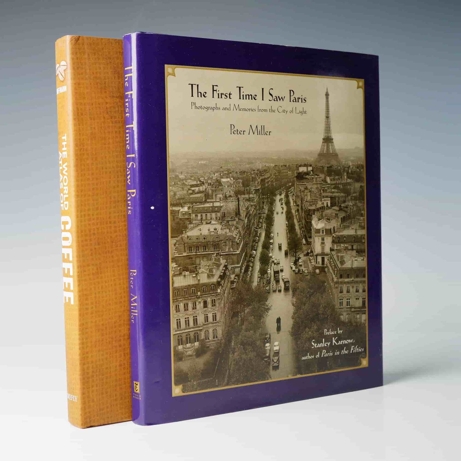2 Hardcover Books, The First Time I Saw Paris, The World Atlas of Coffee: Collection of two hardcover books. Includes "The First Time I Saw Paris: Photographs and Memories from the City of Light" by Peter Miller, a photographic memoir capturing Paris in the 1950s through