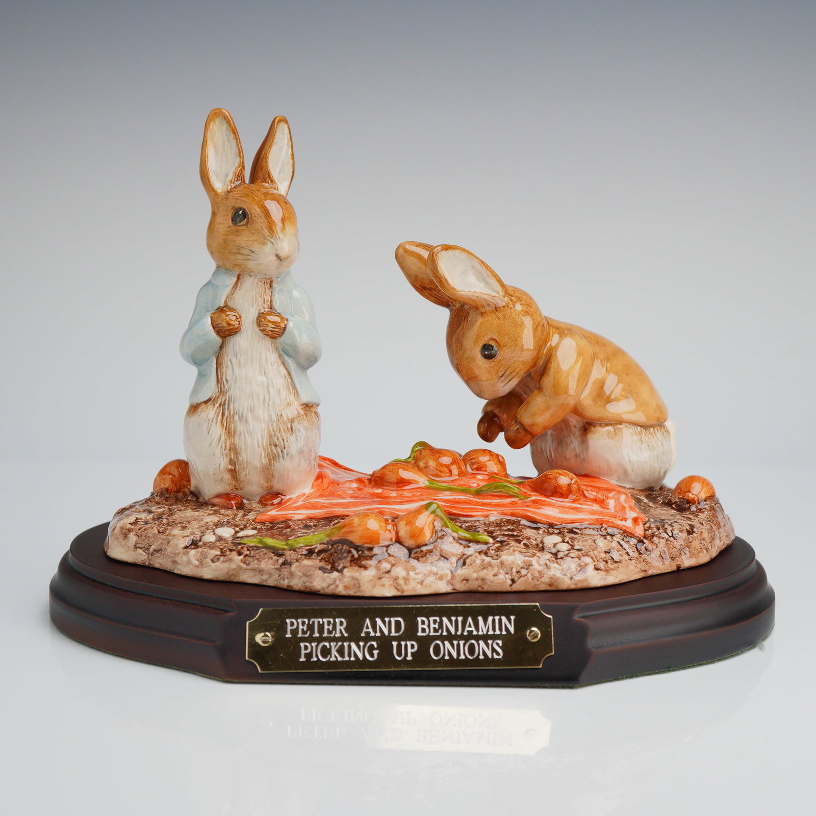 Beswick Potter Tableau Peter and Benjamin Picking Up Onions: A limited edition ceramic figure group by Beswick Ware, titled Peter and Benjamin Picking Up Onions, depicting the Beatrix Potter characters Peter Rabbit and Benjamin Bunny. The tableau is executed in