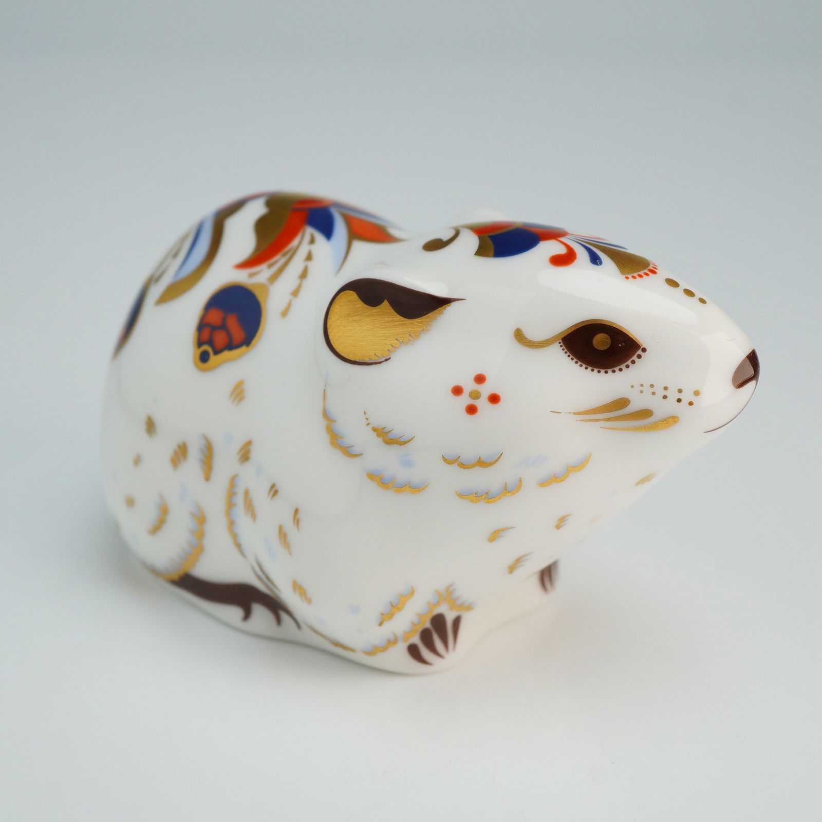 Royal Crown Derby Paperweight, Bank Vole: A Royal Crown paperweight produced as an exclusive for the Royal Crown Derby Collector's Guild. The figurine is decorated in a traditional Imari-style palette featuring cobalt blue, iron red, and 22ct