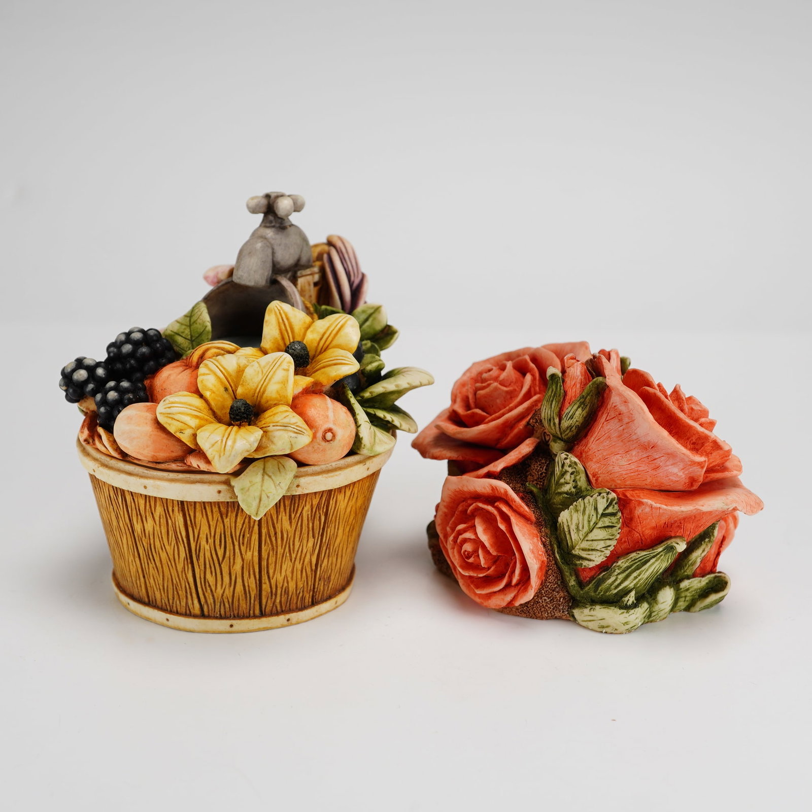 2pc Harmony Kingdom Boxes, Fall Bouquet and Double Pink Rose: A collection of two Harmony Kingdom sculpted resin trinket boxes from the Harmony Garden series. The lot includes the Fall Bouquet box, dated 2000, which is modeled as a wooden barrel topped with an a