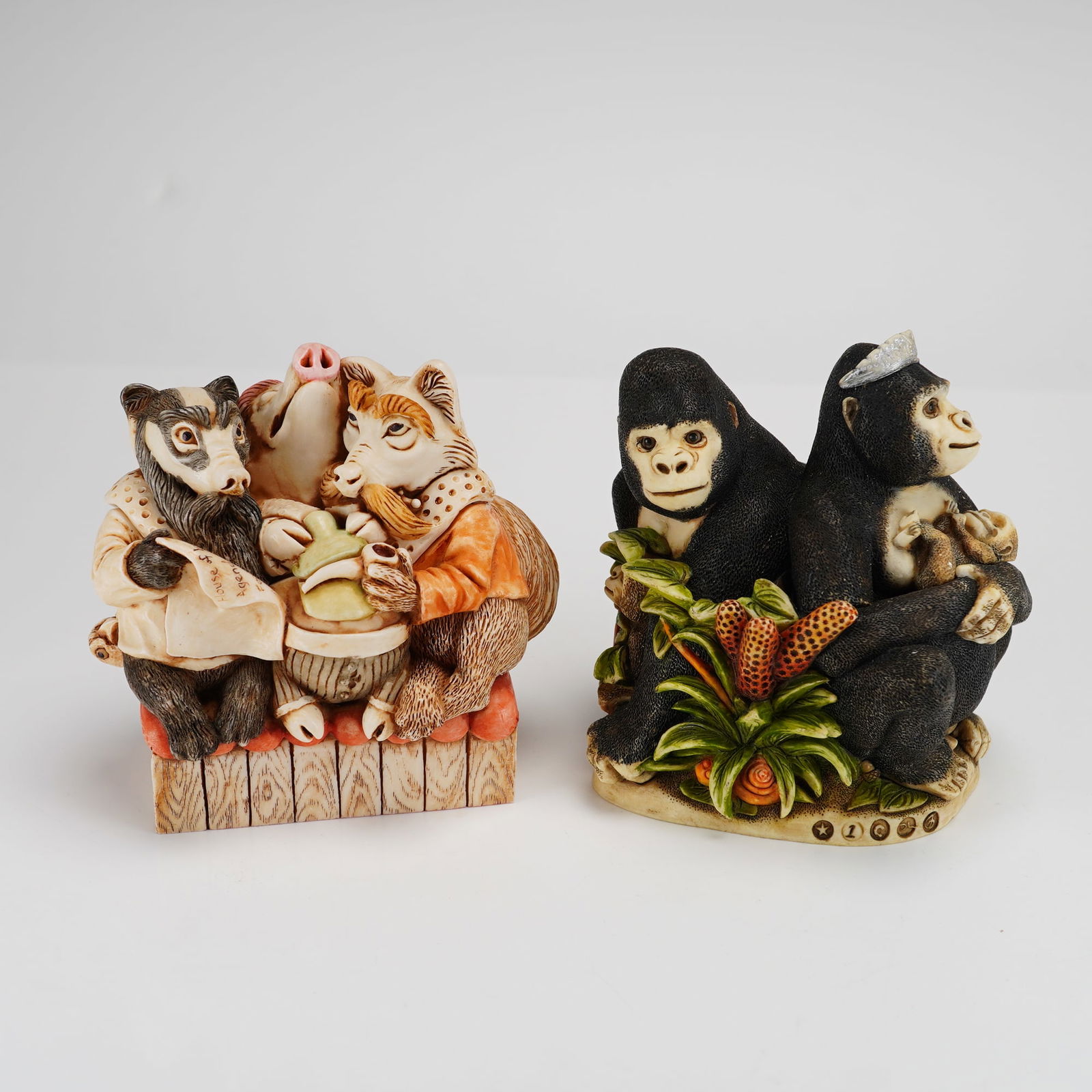 2pc Harmony Kingdom Treasure Boxes, Queen of the Jungle and House Party: A collection of two Harmony Kingdom cast resin trinket boxes featuring the House Party and Queen of the Jungle designs. The House Party piece was designed by Peter Calvesbert and manufactured in Engla