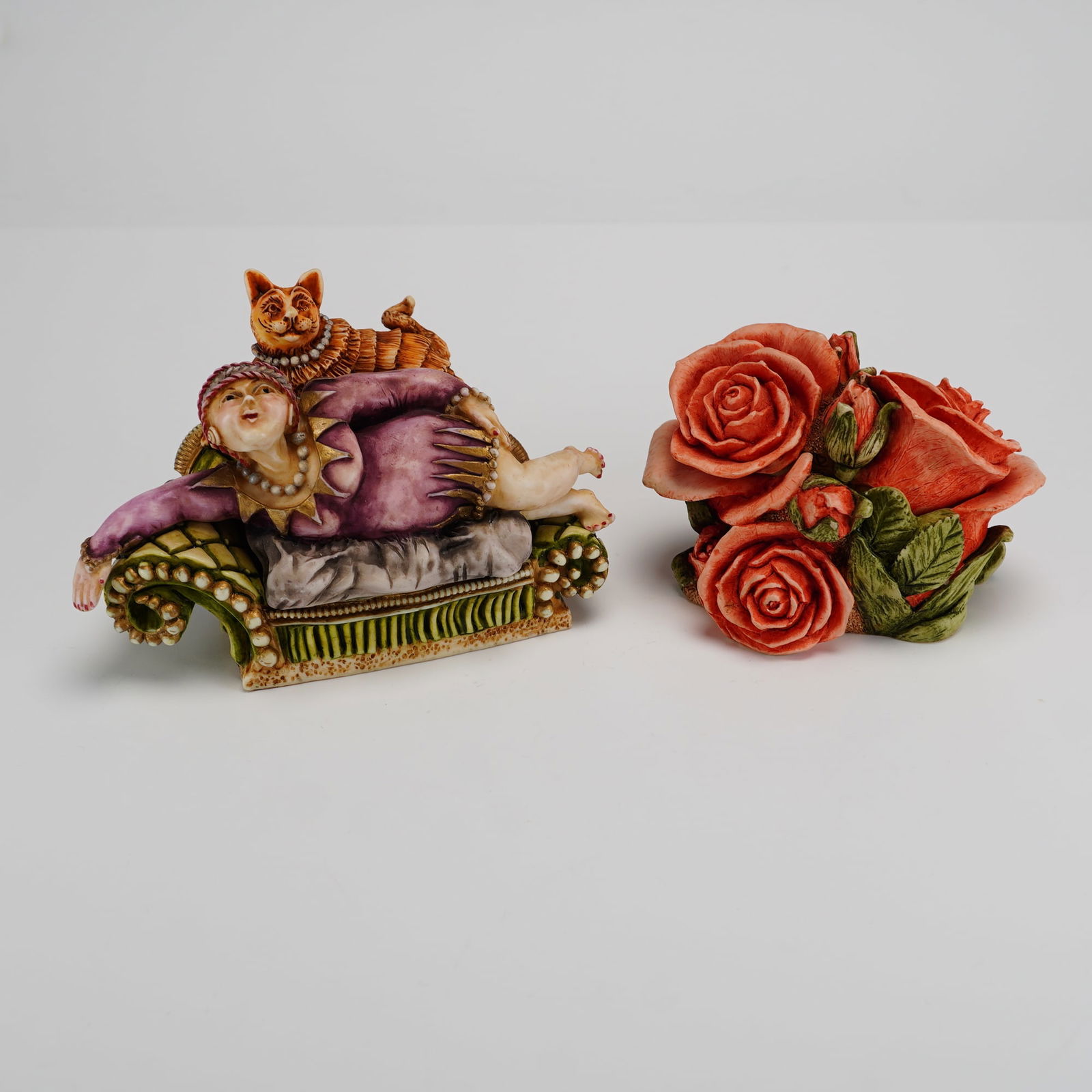 2pc Harmony Kingdom Trinket Boxes, Kiki & Cat and Double Pink Rose: A group of two Harmony Kingdom crushed marble resin trinket boxes featuring detailed designs and hidden interior compartments. The first piece, titled Kiki & Cat from the Clair de Lune collection, dep