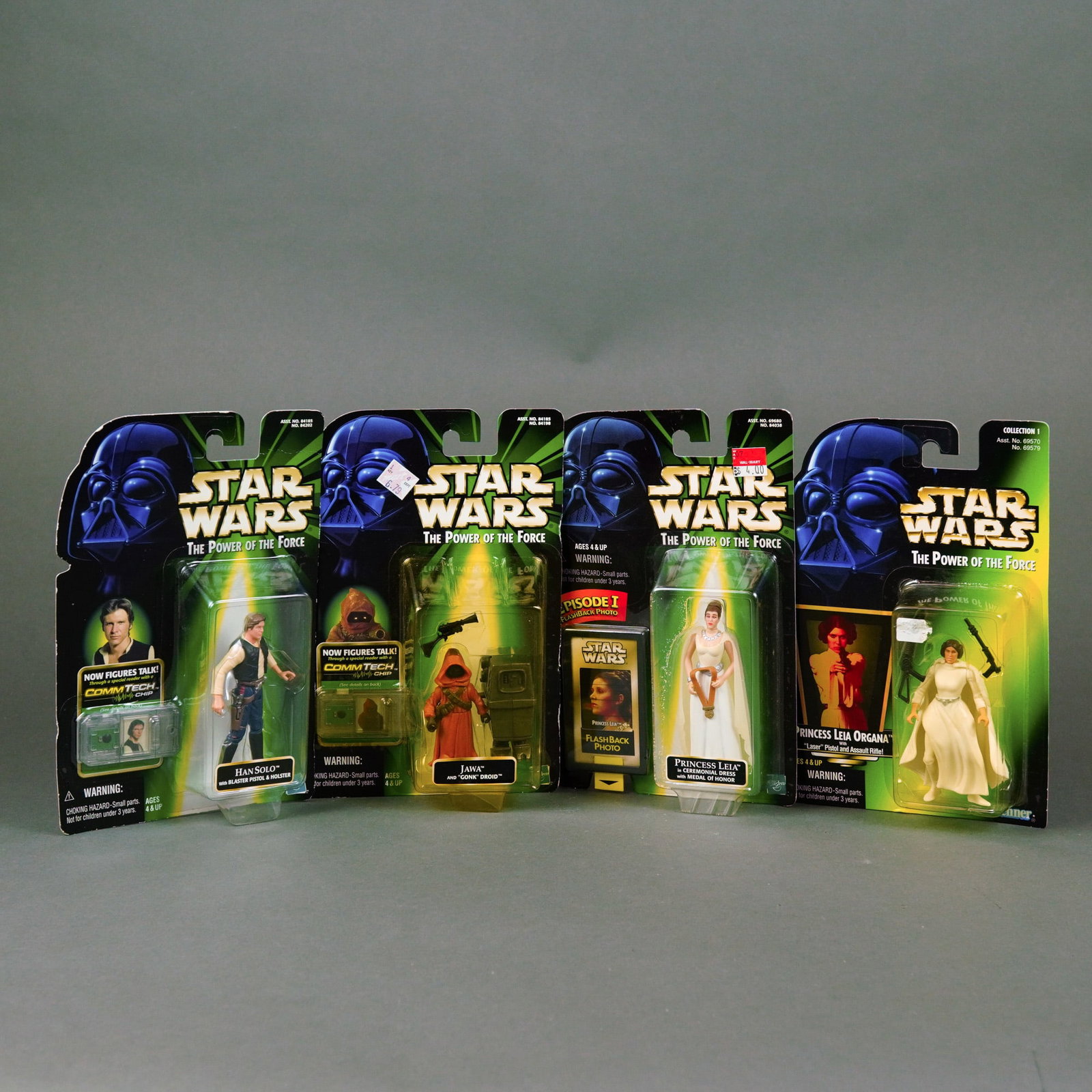 Kenner Star Wars The Power of the Force Action Figure Collection, Late 1990s: A collection of four original Star Wars: The Power of the Force action figures manufactured by Kenner. Each figure is constructed of molded plastic and remains sealed in its original factory blister p