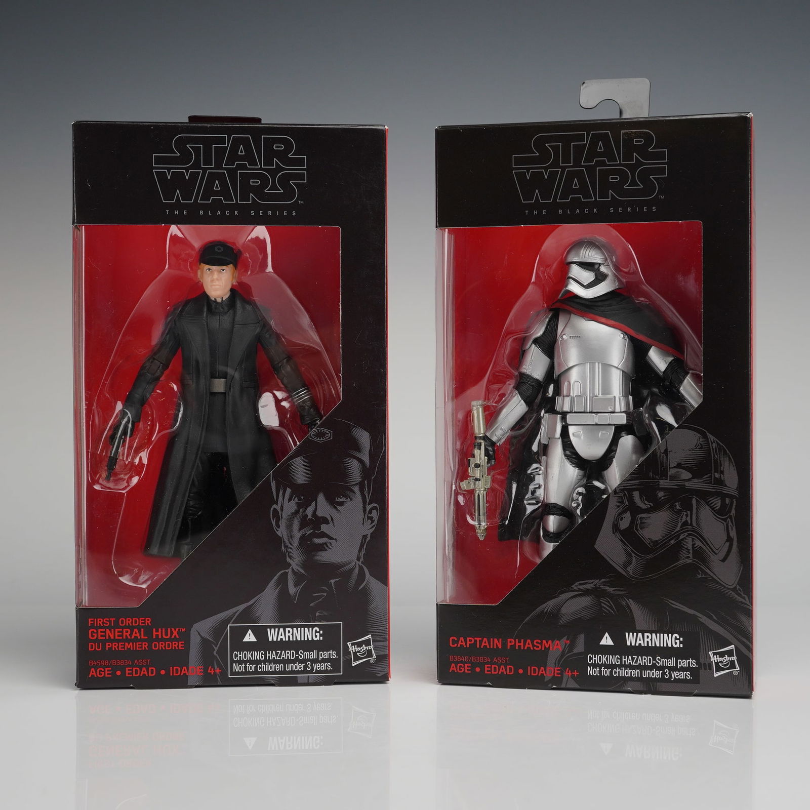 2pc Star Wars Black Series Phasma and Hux Figures: A collection of two Star Wars The Black Series figurines manufactured by Hasbro individually sealed in their original window display packaging. The figures include Captain Phasma, depicted in distinct