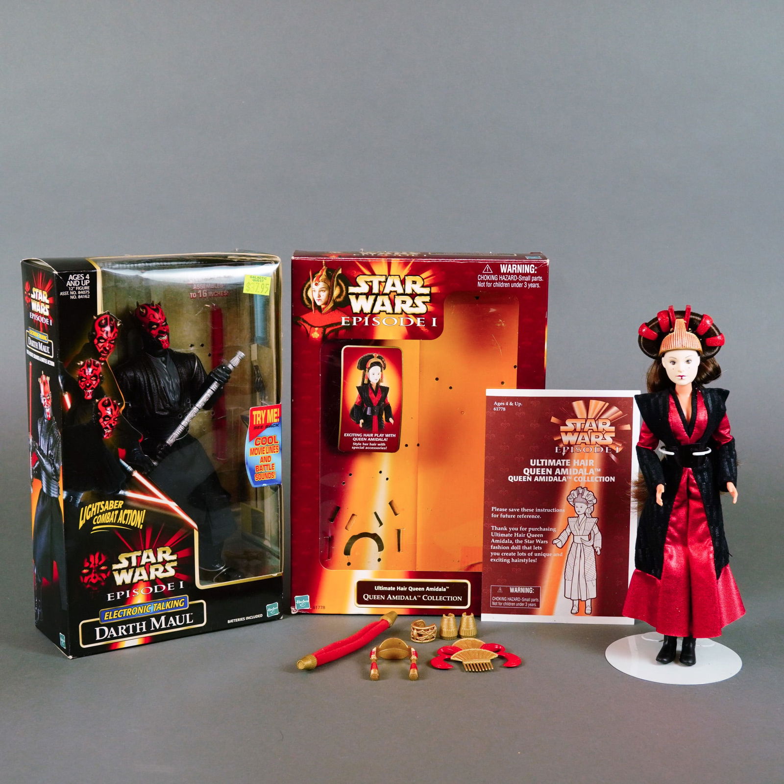 Hasbro Star Wars Episode I Darth Maul and Queen Amidala Figures, circa 1998-1999: This lot features a pair of large-scale figures manufactured by Hasbro for the Star Wars: Episode I collection, released circa 1998-1999. The first item is a 12-inch scale Darth Maul Electronic Talkin