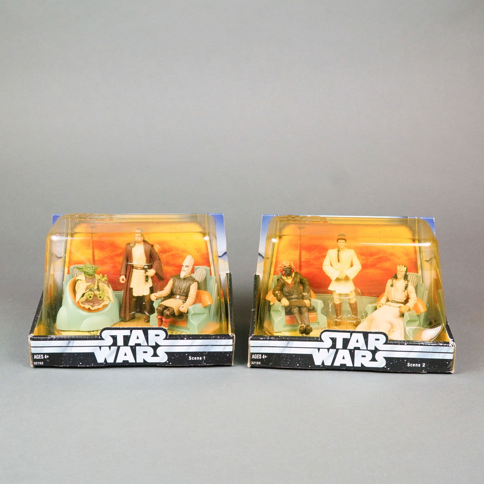 A Pair of Hasbro Star Wars The Phantom Menace Jedi High Council Sets, 2003.: Manufactured by Hasbro, this pair of plastic action figure diorama sets features characters from Star Wars: Episode I - The Phantom Menace. Released around 2003 as part of the Original Trilogy Collect