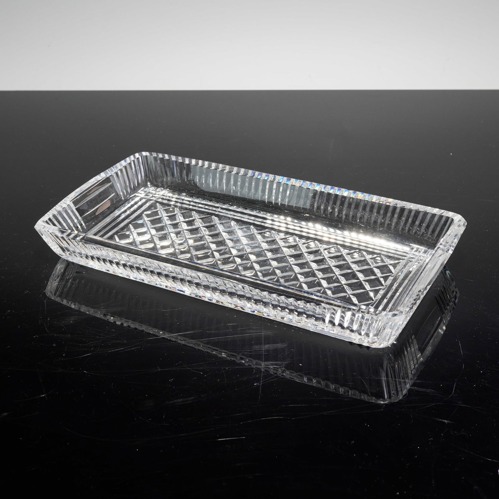 Waterford Crystal Rectangular Vanity Tray: A fine Waterford lead crystal rectangular vanity tray, also utilized as a mint or desk tray. This piece features a sophisticated geometric hand-cut design with a central field of crosshatch diamonds b