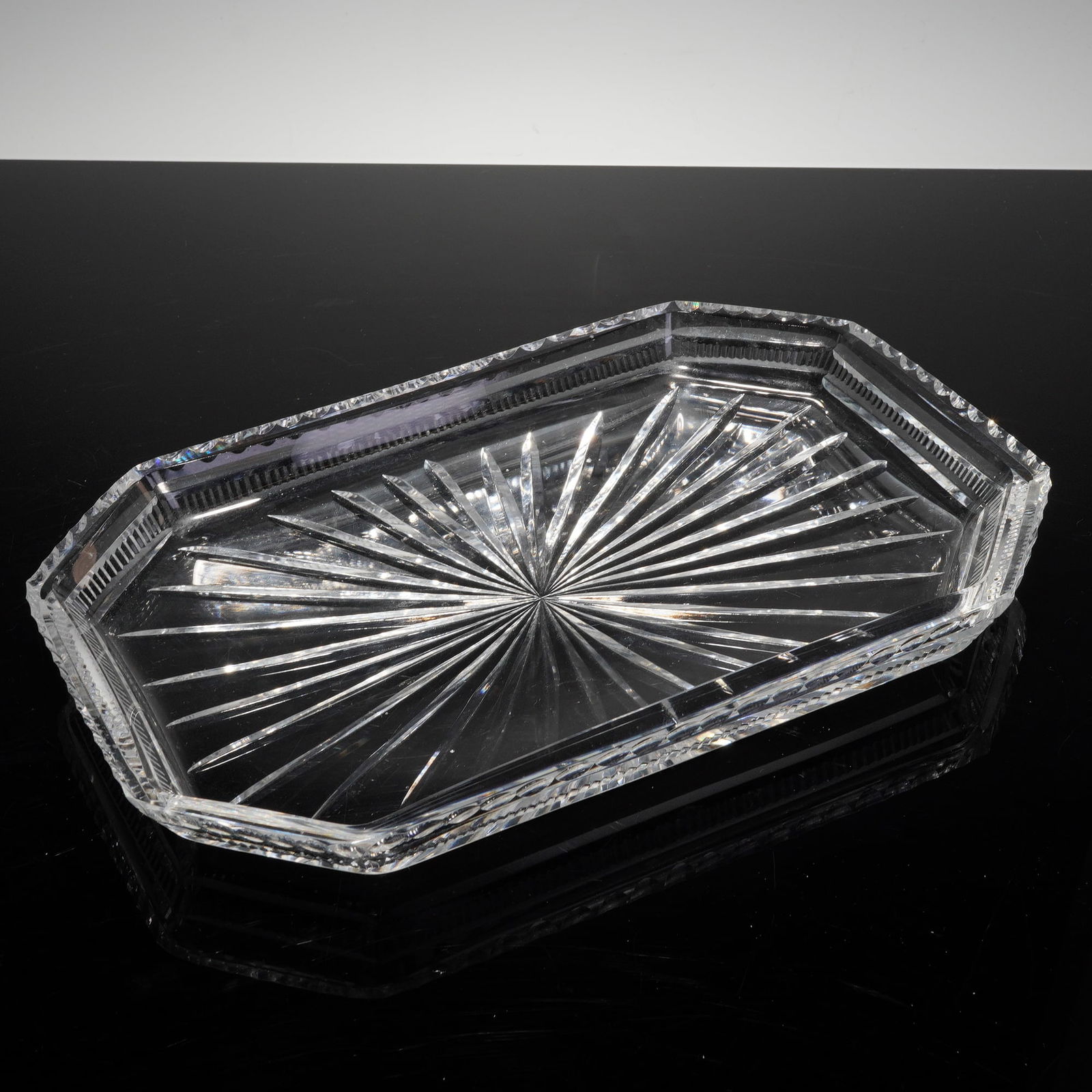 Waterford Star Cut Art Deco Crystal Oblong Tray: This finely crafted piece is an Art Deco Crystal Oblong Tray produced by Waterford, likely dating to the 1990s. The tray features a prominent, deeply cut sunburst pattern radiating from the center of
