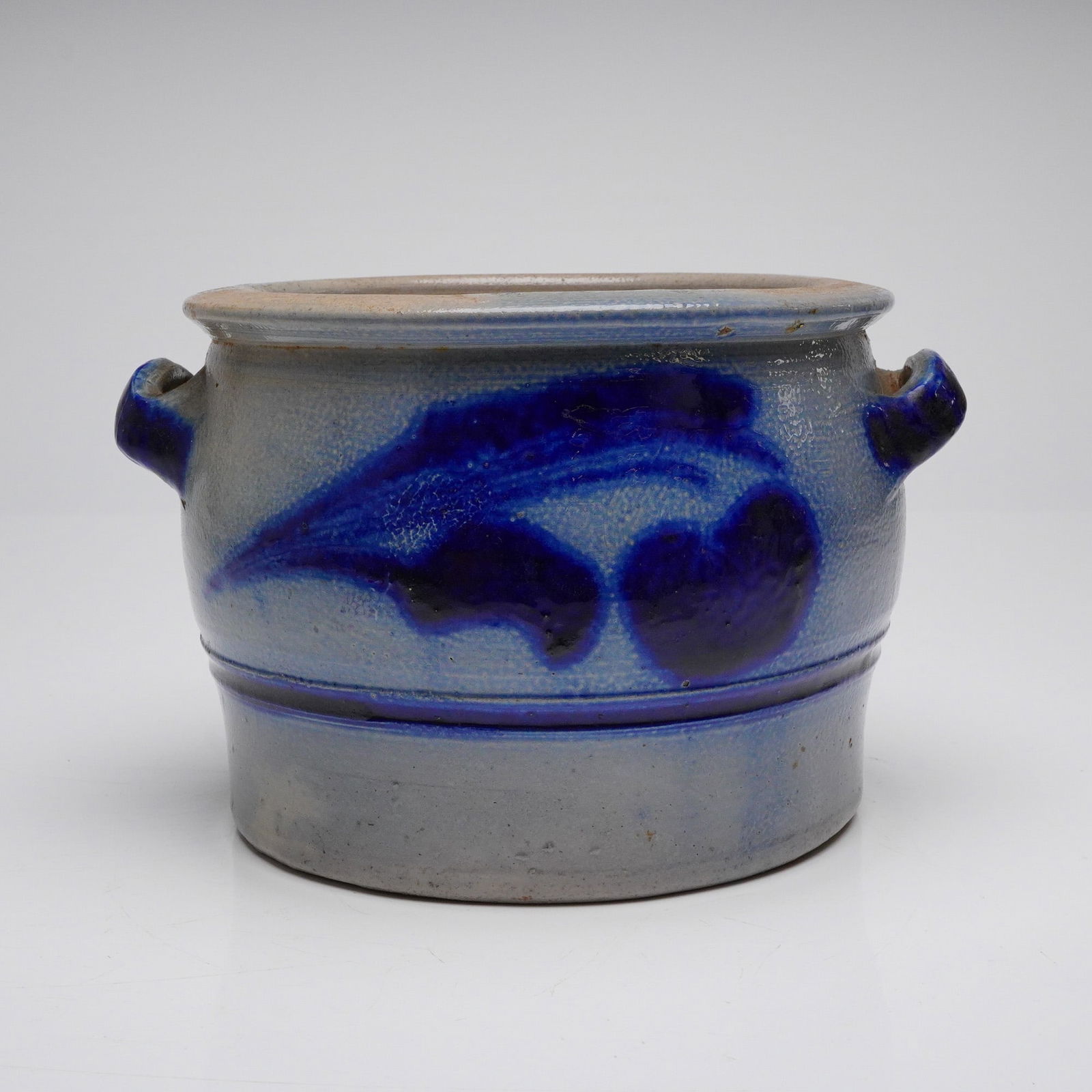 Westerwald Salt-Glazed Stoneware Storage Crock, Marked 7 1/2: A single Westerwald salt-glazed stoneware storage crock, identified as German or European in origin. This handled vessel features a gray/buff body with a characteristic salt glaze finish. The form is