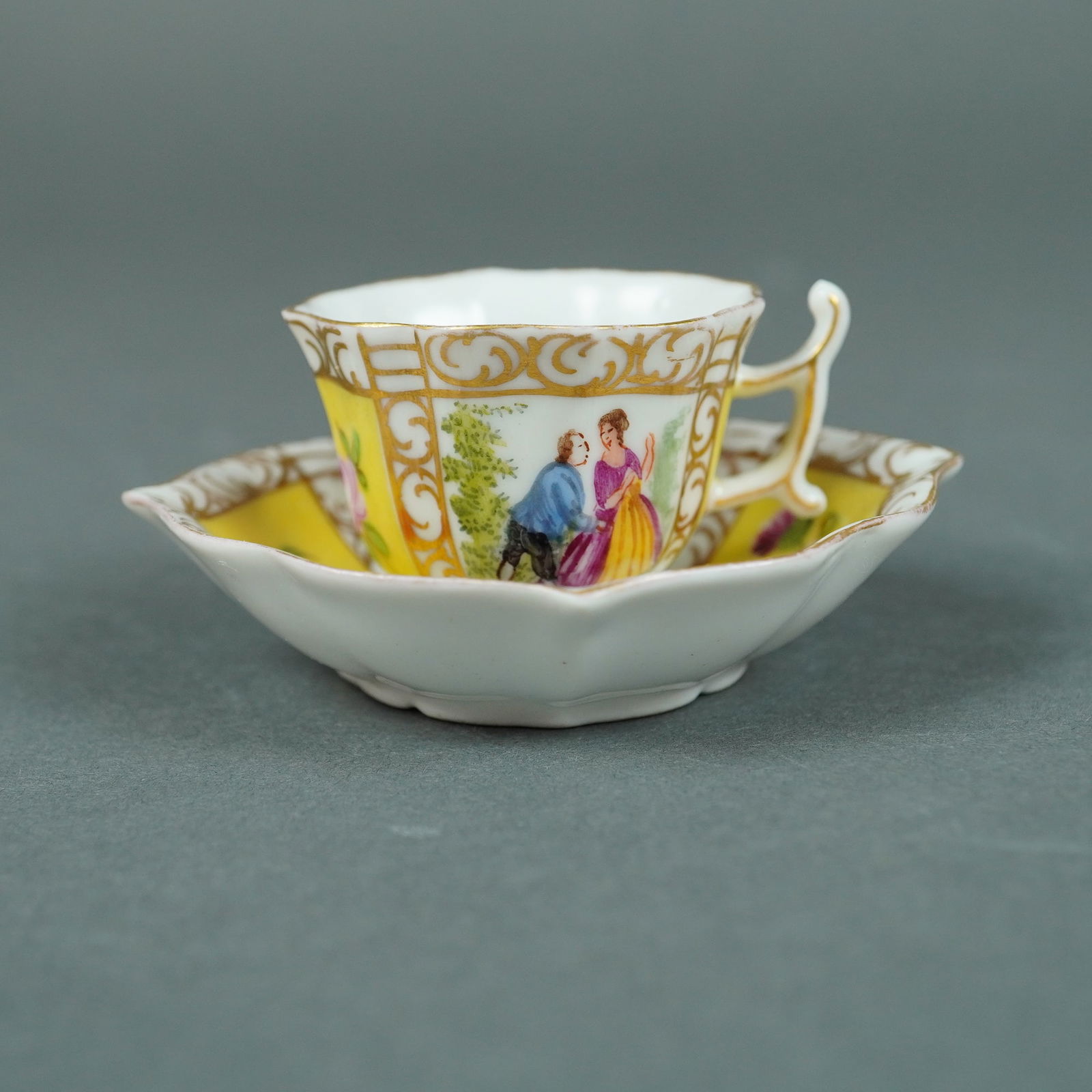 2 Thieme Potschappel Dresden Yellow Quatrefoil Cup & Saucer: A pair of porcelain demitasse items identified through market consensus as Thieme Potschappel Dresden, featuring the Yellow Quatrefoil pattern. The set consists of a miniature cup and saucer. The porc