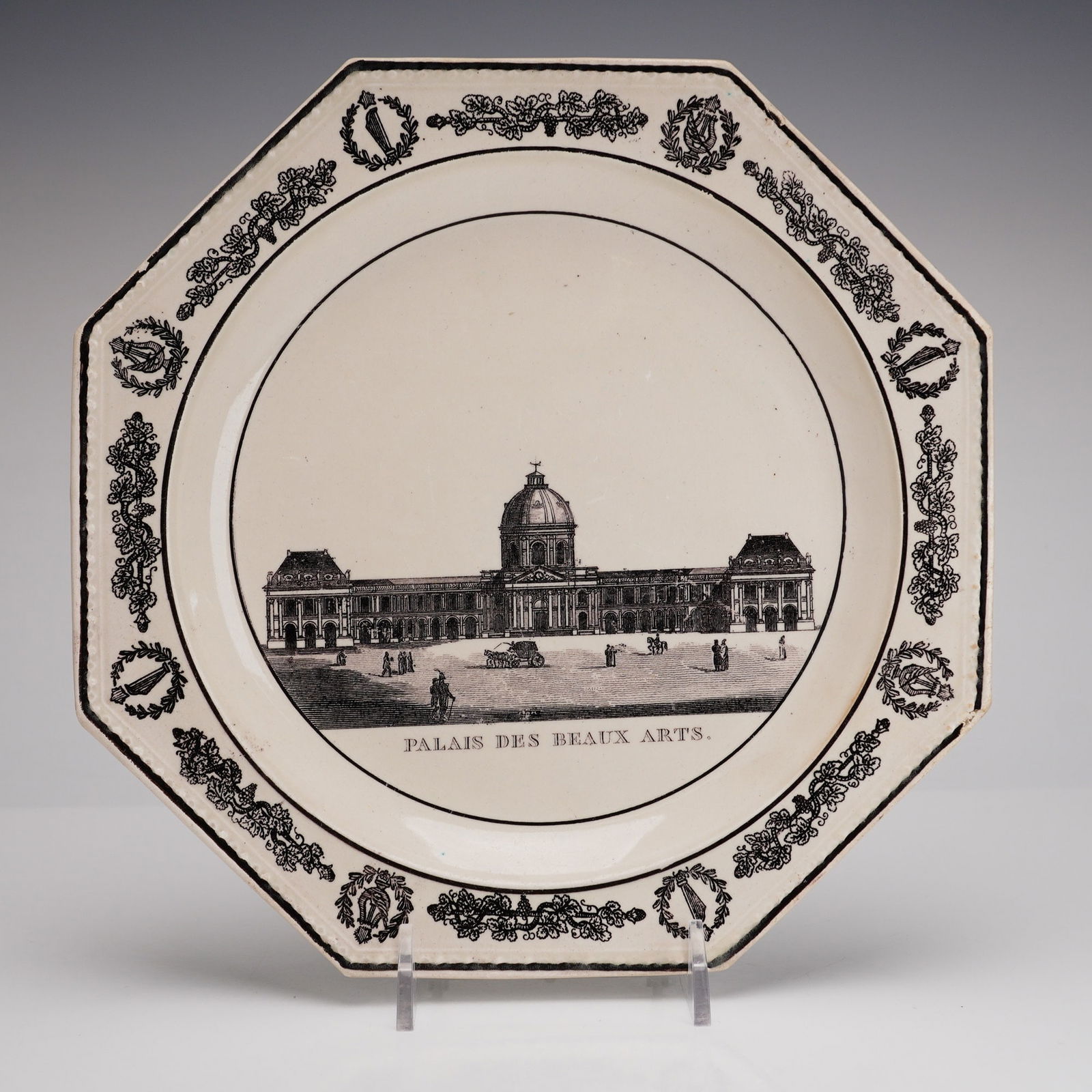 Wedgwood Octagonal Creamware Palais des Beaux Arts Transfer-Printed Plate: This mid-19th century Wedgwood creamware octagonal plate features a finely detailed black transfer-printed architectural view of the Palais des Beaux Arts in Paris. the central scene depicts the neocl