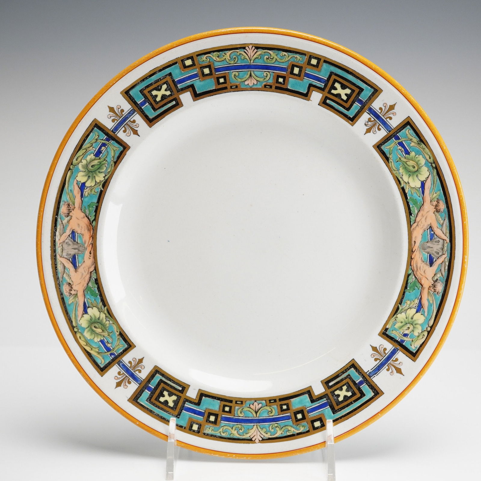 Wedgwood Pearlware Plate, Clarence: This dinner plate features a wide polychrome decorated rim framed by a bright yellow-gold outer band. The vibrant palette utilizes turquoise, cobalt blue, green, and black pigments. The complex border