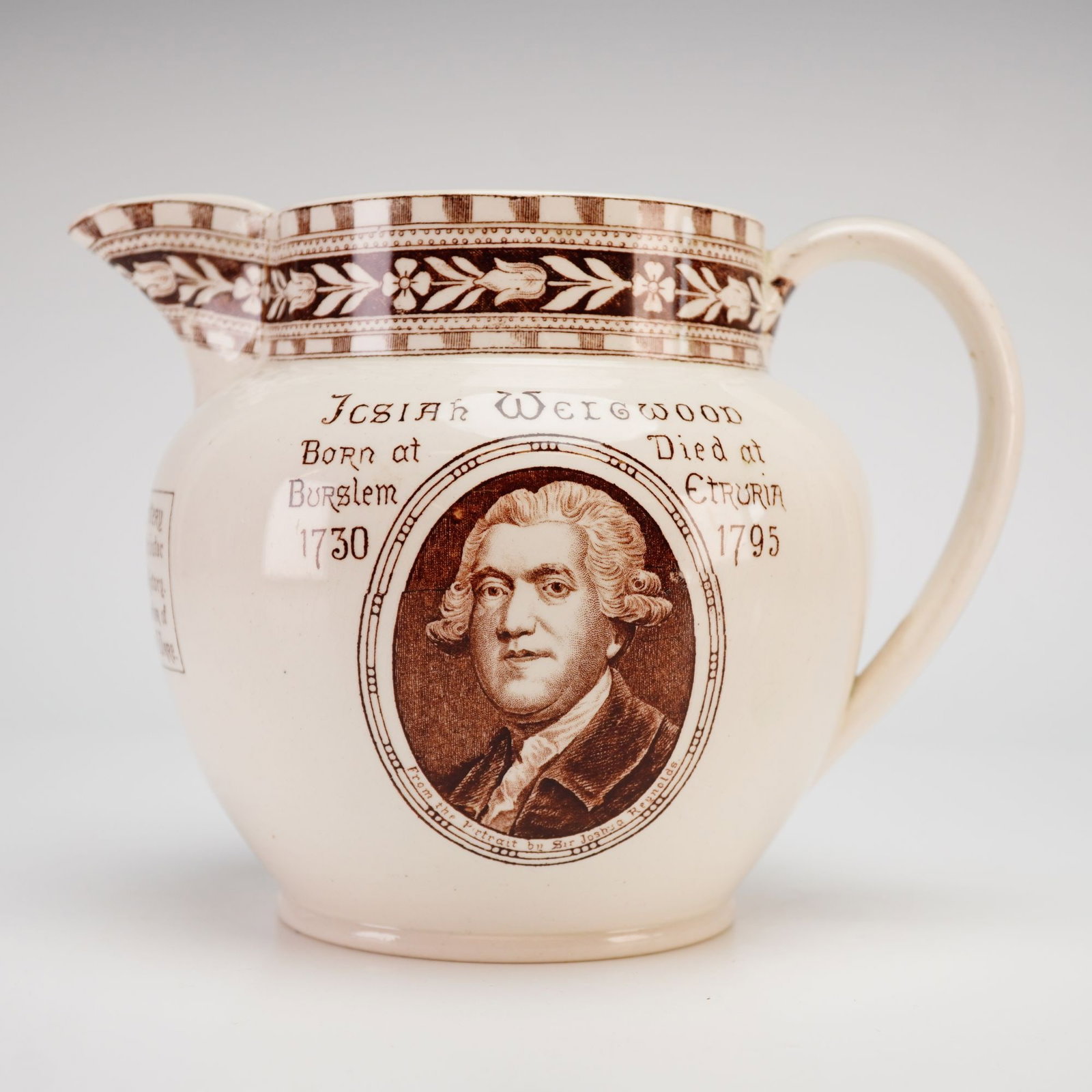 Wedgwood Queensware Commemorative Pitcher c. 1885: Wedgwood Queen's Ware commemorative pitcher, circa 1885. This creamware vessel features brown transfer-printed decorations on a cream-colored earthenware body. The primary face displays a portrait of