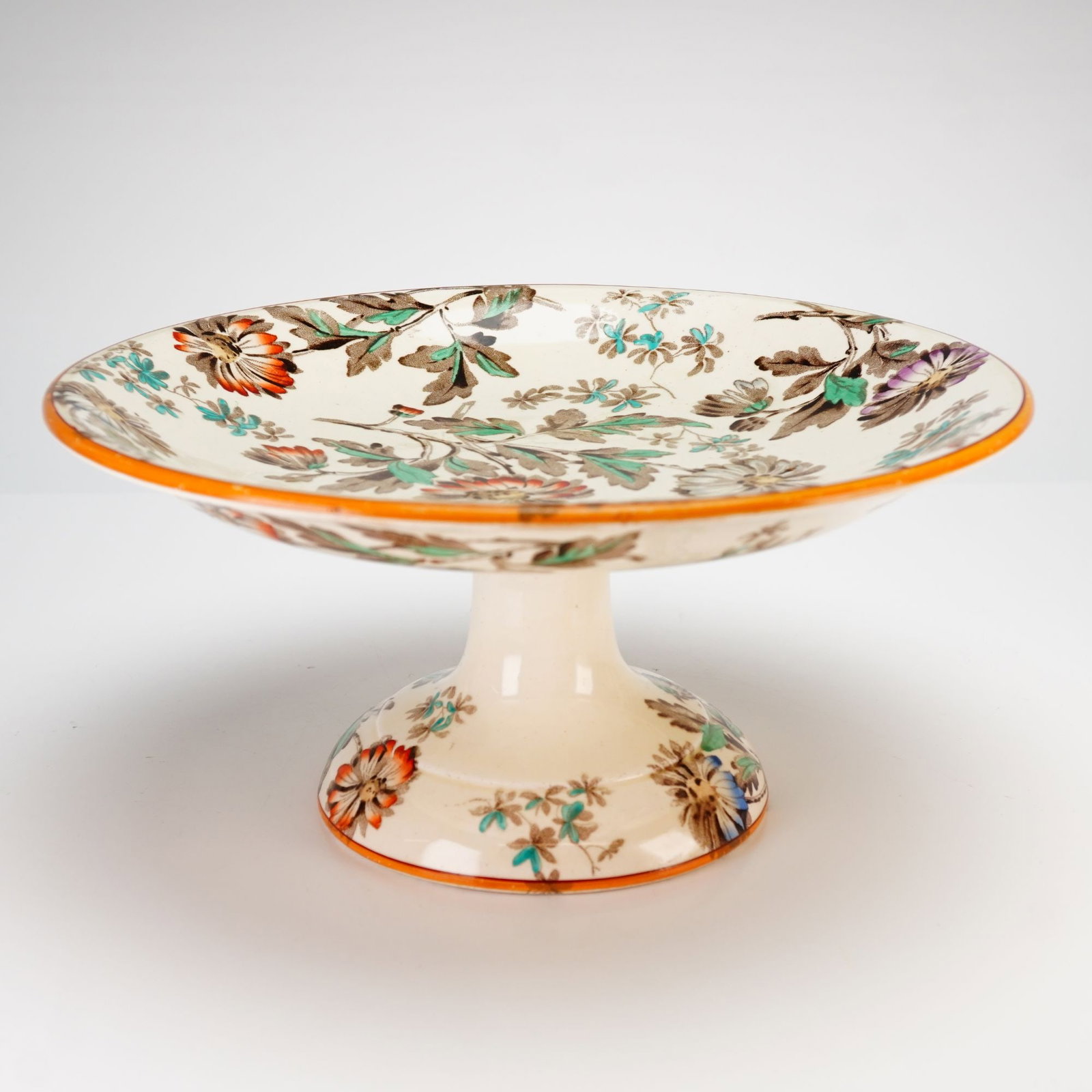 Wedgwood Beatrice Aesthetic Movement Pedestal Serving Bowl or Tazza: A Wedgwood Beatrice pattern Aesthetic Movement ceramic pedestal serving bowl or tazza. The piece features a shallow, wide bowl supported by a central tapered column on a flared foot. The decoration co