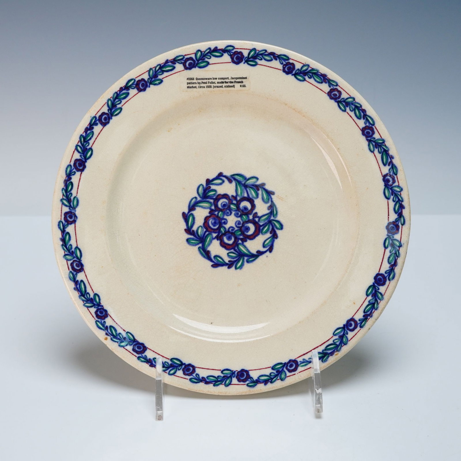 A Wedgwood 'Jacqueminot' Comport by Paul Follot, Circa 1920: A Wedgwood 'Jacqueminot' pattern low comport, designed by Paul Follot, made in Etruria, England, for the French market, circa 1920. The off-white ceramic comport features a stylized floral and foliate
