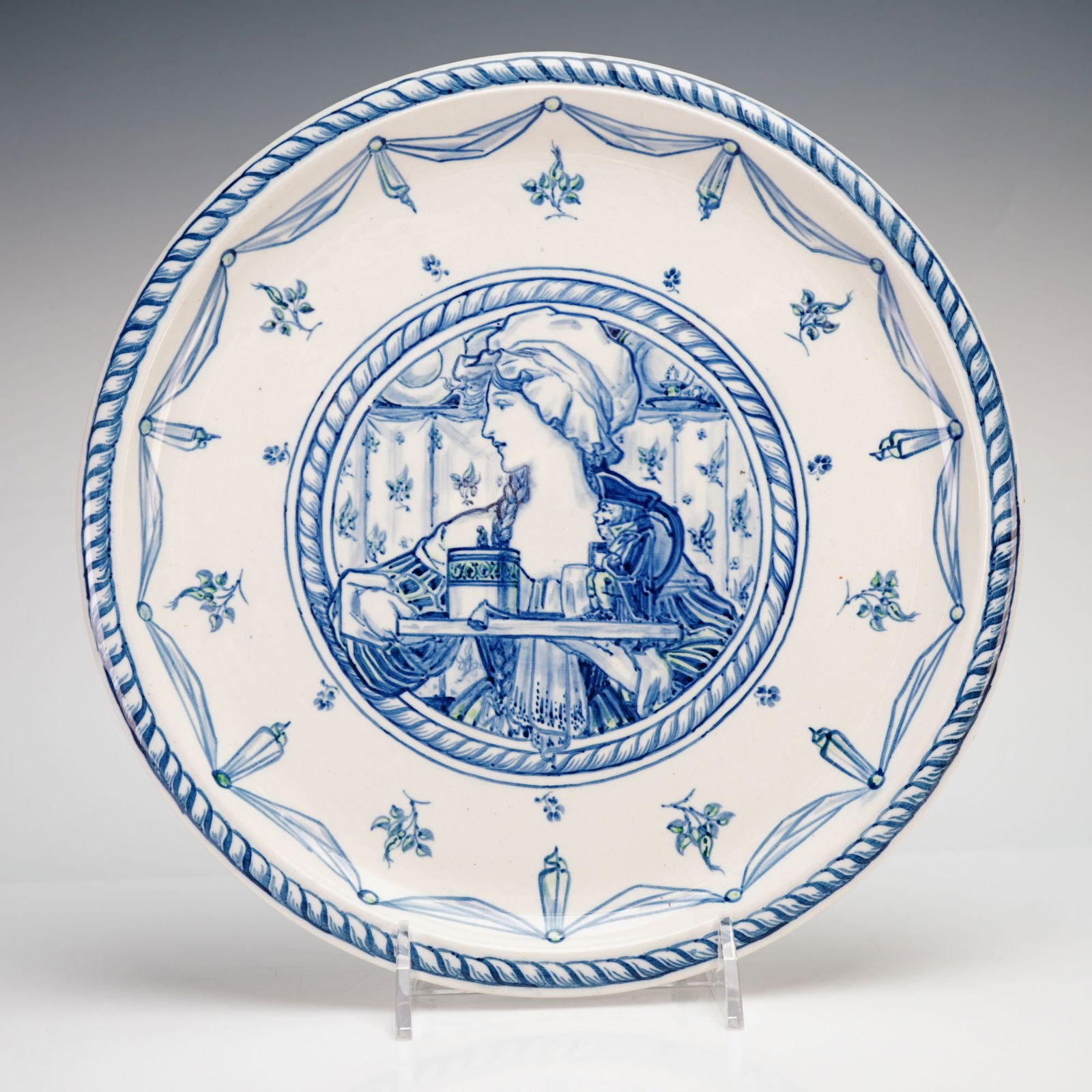 Rare Wedgwood Ivanhoe Blue and White Porcelain Plate: This rare Wedgwood porcelain plate is part of the Ivanhoe series, featuring blue and white transferware decoration. The central circular medallion depicts a woman in profile wearing a bonnet, holding