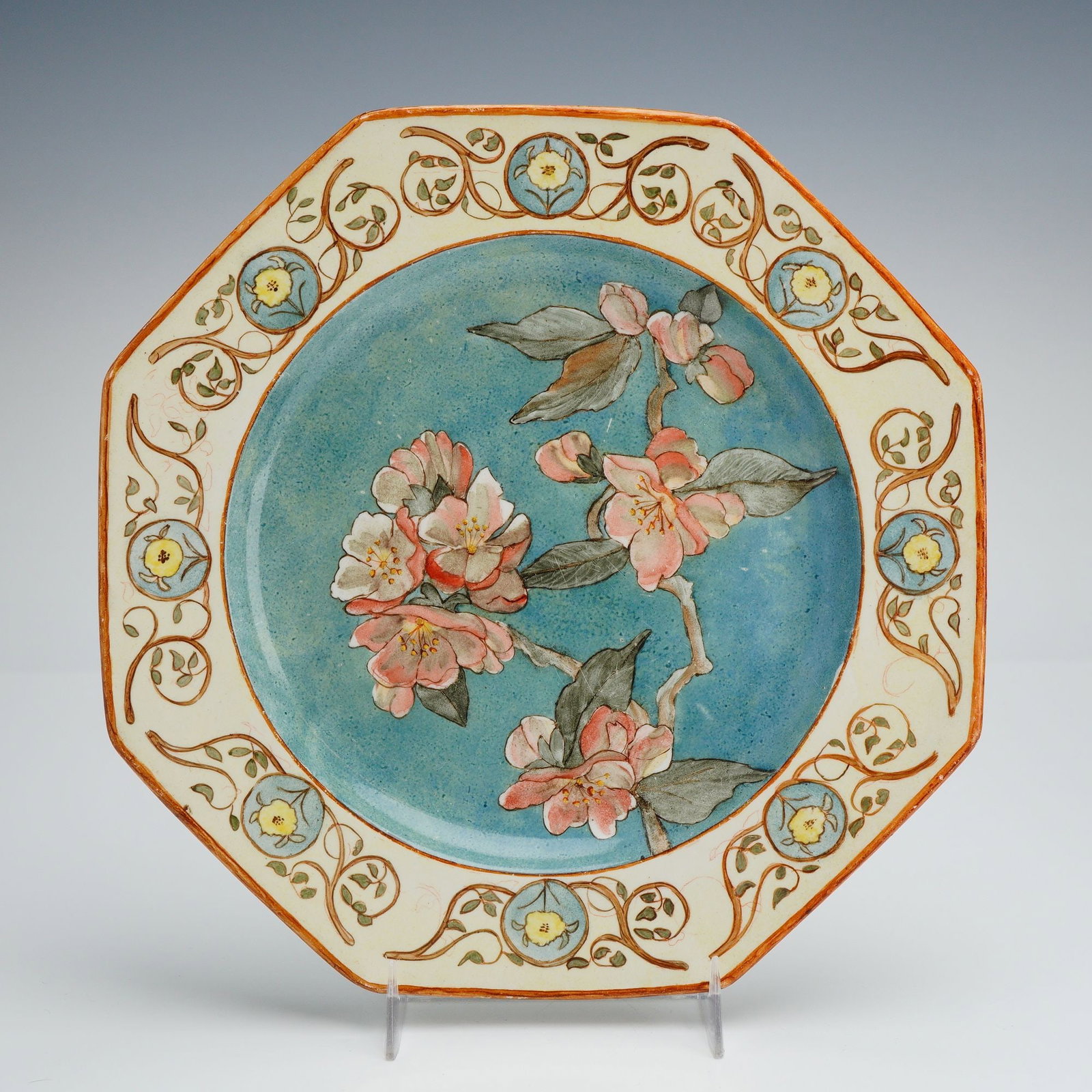 Wedgwood Cherry Blossom Plate: A fine Wedgwood octagonal ceramic plate, featuring a Cherry Blossom motif. The central well is decorated with a hand-painted spray of pink cherry blossoms and grey-green leaves against a mottled blue