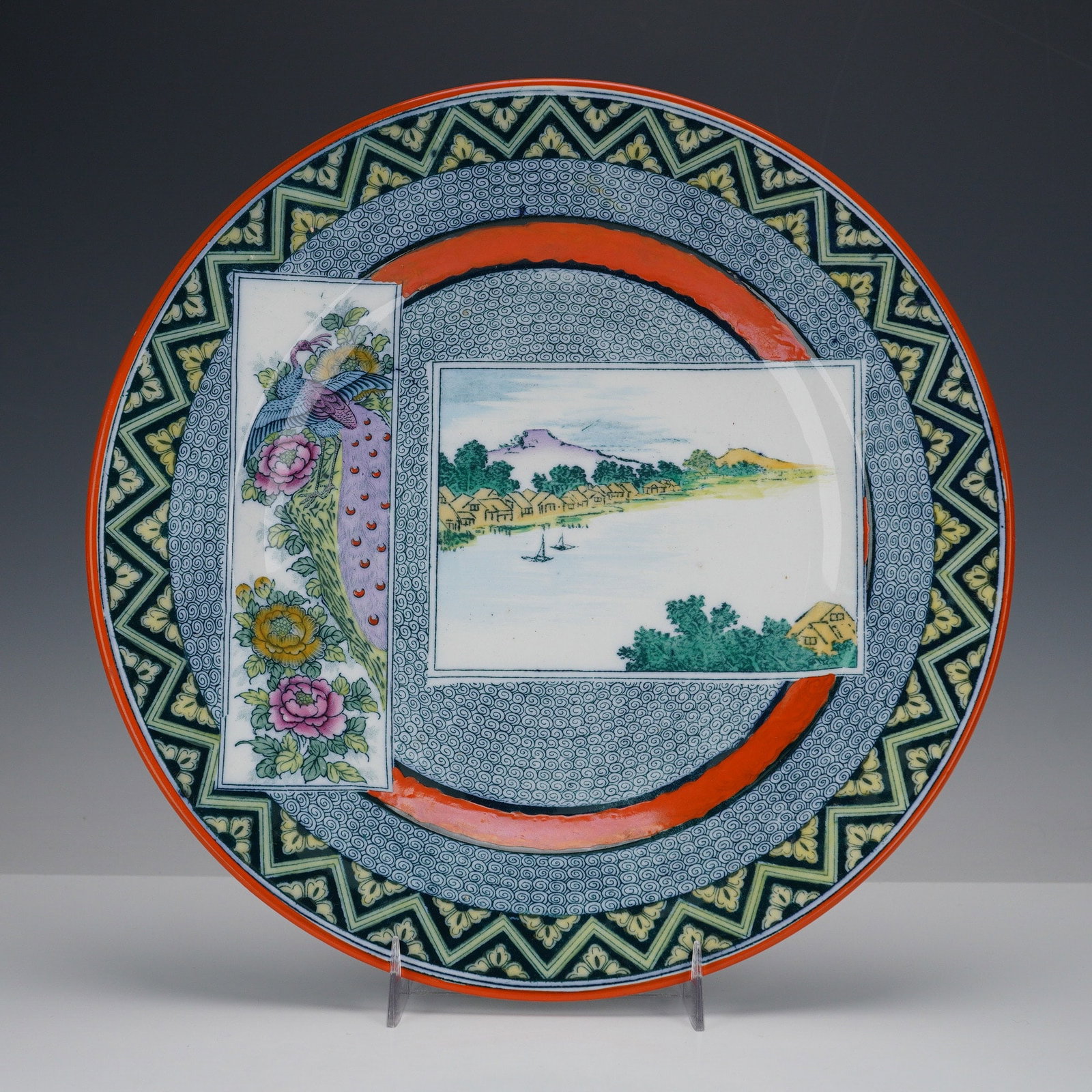 Wedgwood Etruria Earthenware Japonesque Plate, Mekado: A circular plate decorated in the Japonesque style. It features a segmented design with a rectangular landscape panel depicting buildings, trees, and boats on the water, alongside an adjacent vertical