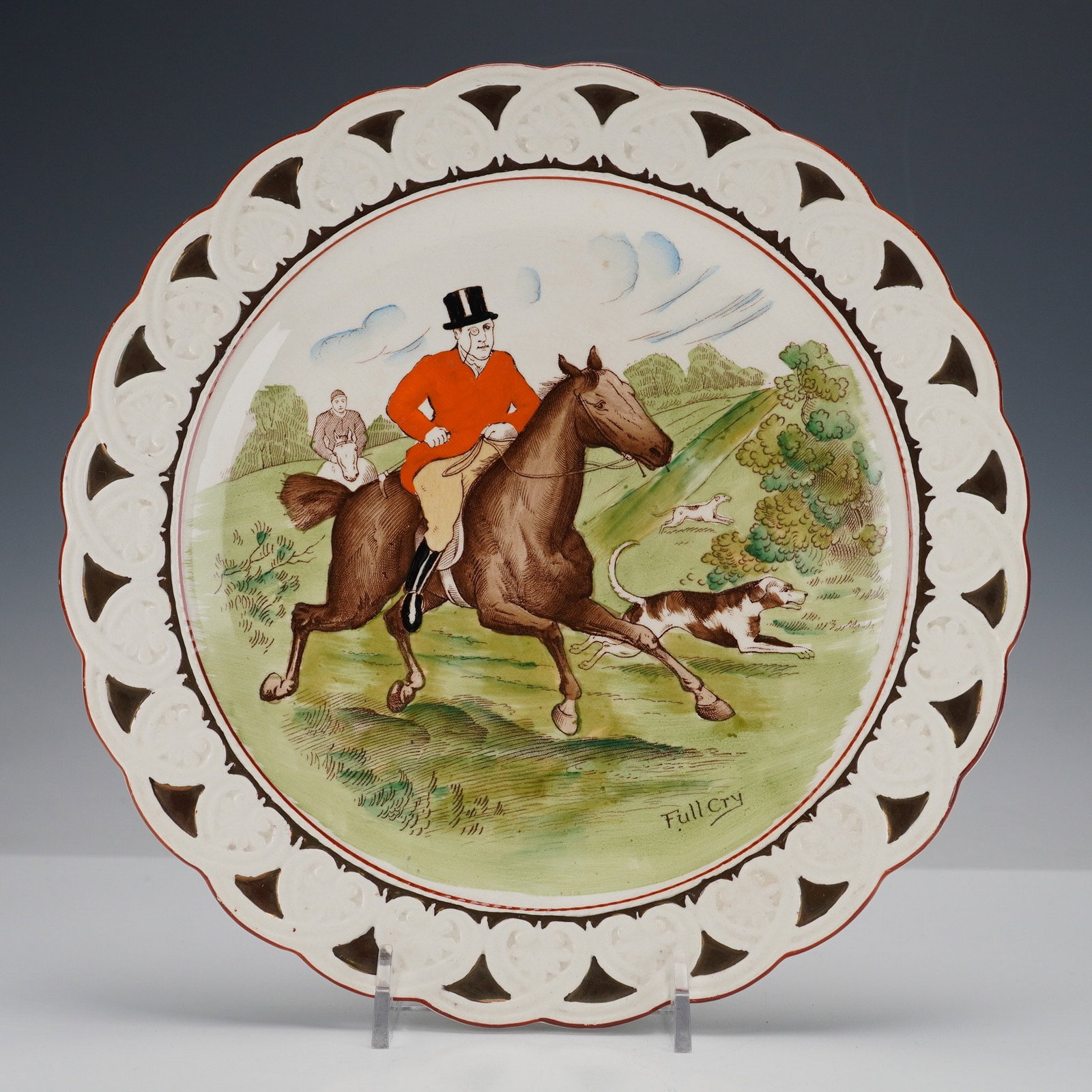 Wedgwood Glazed Ceramic Plate, Sporting Dogs Collection 'Full Cry': A decorative, glazed ceramic plate by Wedgwood, featuring the Patrician shape with a polychrome Hunting Scene decoration from the Sporting Dogs series. The central image depicts a gentleman in a red c