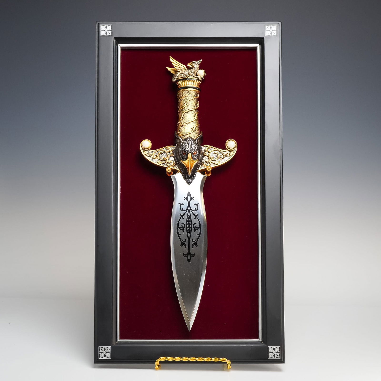 China, Franklin Mint The Sentinel of Wisdom Decorative Fantasy Dagger, Late 20th Century: This is a contemporary decorative fantasy dagger titled The Sentinel of Wisdom, designed by artist Greg Hildebrandt for The Franklin Mint. The piece features a leaf-shaped, double-edged stainless stee