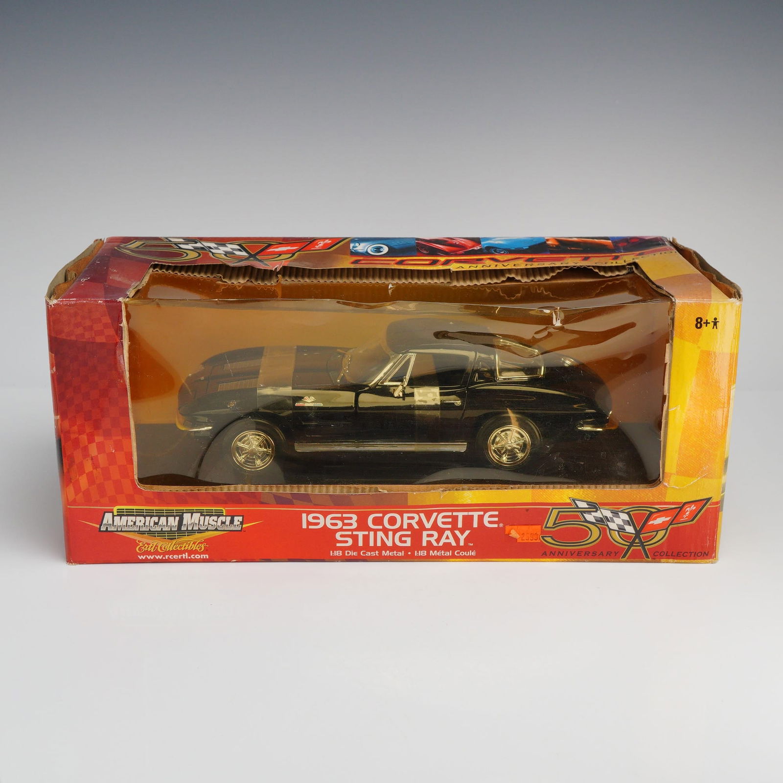 Ertl American Muscle 1963 Corvette Sting Ray 1:18 Scale Model, 2002.: Manufactured by Ertl Collectibles (RC Ertl, Inc.) as part of the American Muscle series, this 1:18 scale model depicts a 1963 Chevrolet Corvette Sting Ray. Released in 2002 to commemorate the Corvette