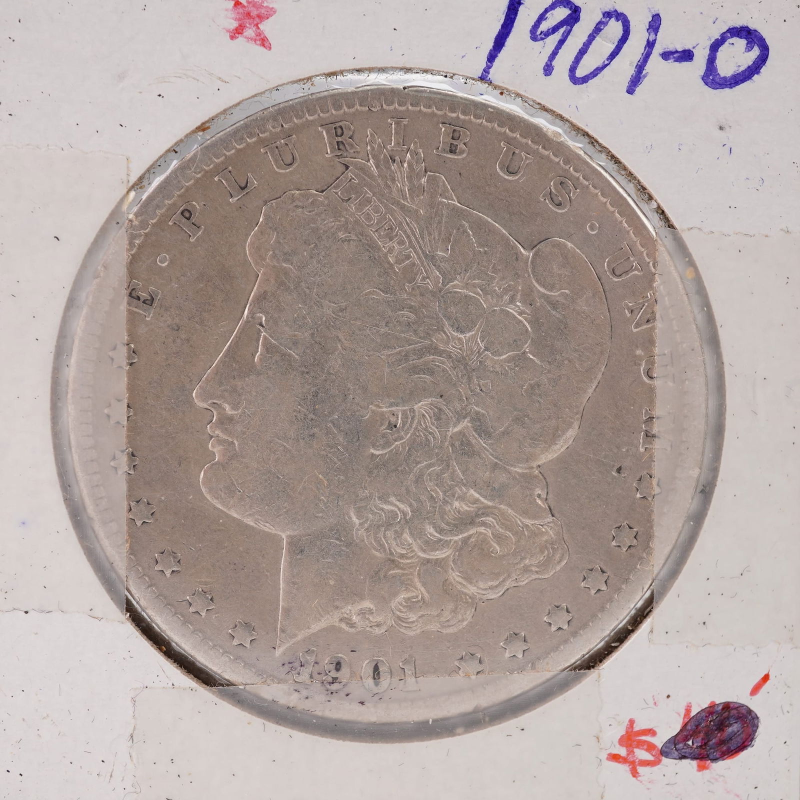 1901-O Morgan Silver Dollar: Struck at the New Orleans Mint. Composed of 90% silver and 10% copper, with a total weight of 26.73 grams, containing 0.7734 troy ounces of pure silver. The obverse features a left-facing portrait of