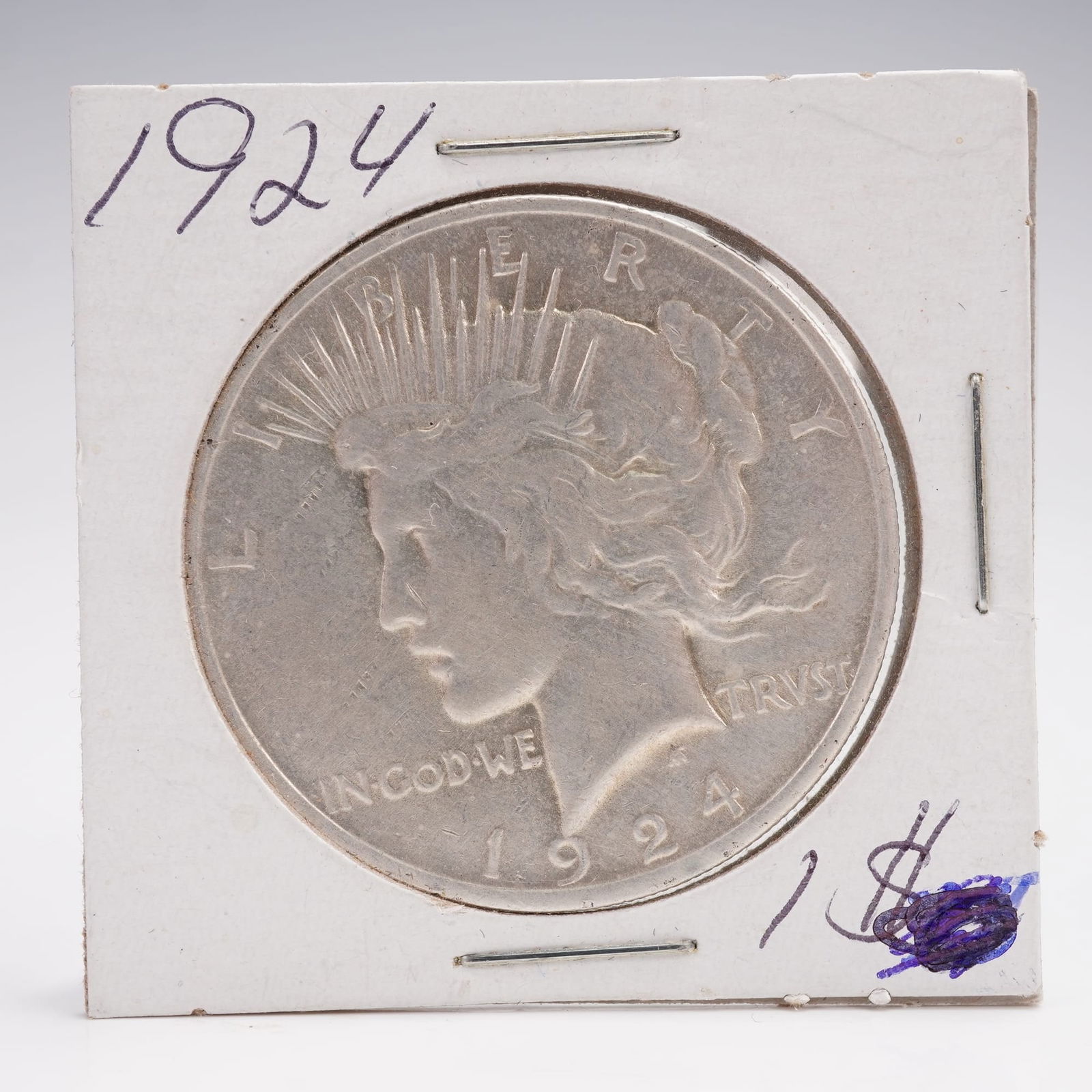 1924 Peace Silver Dollar: Composed of 90% silver and 10% copper with a total weight of 26.73 grams, containing 0.999 troy ounces of fine silver. The obverse features the profile of Lady Liberty with a radiating crown, accompan